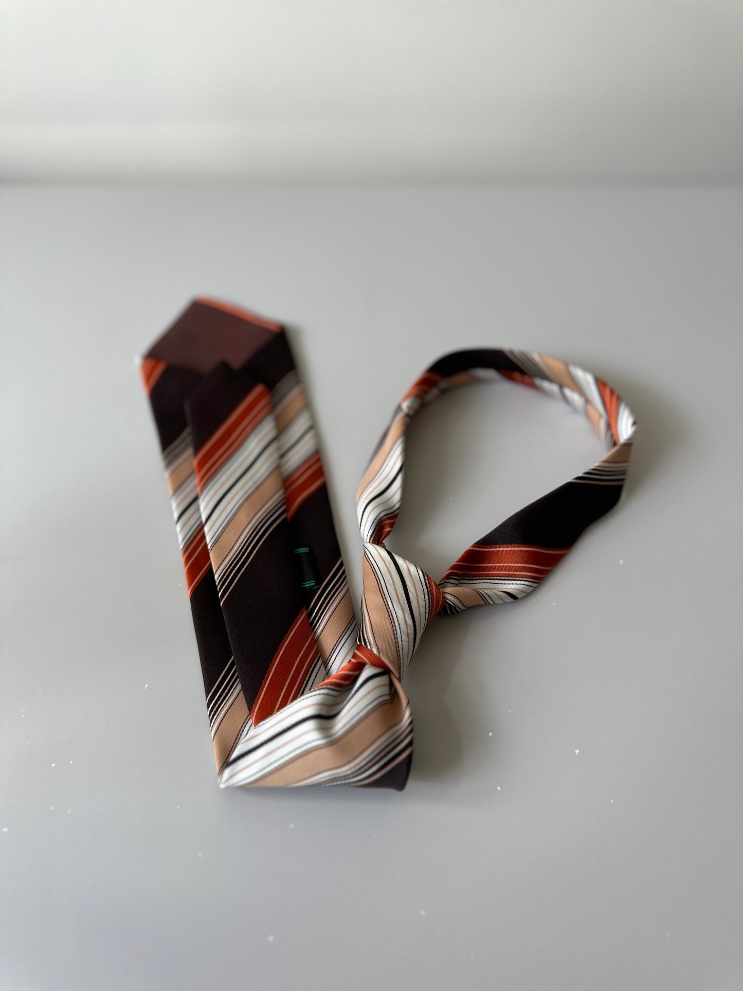 orange diagonal striped tie