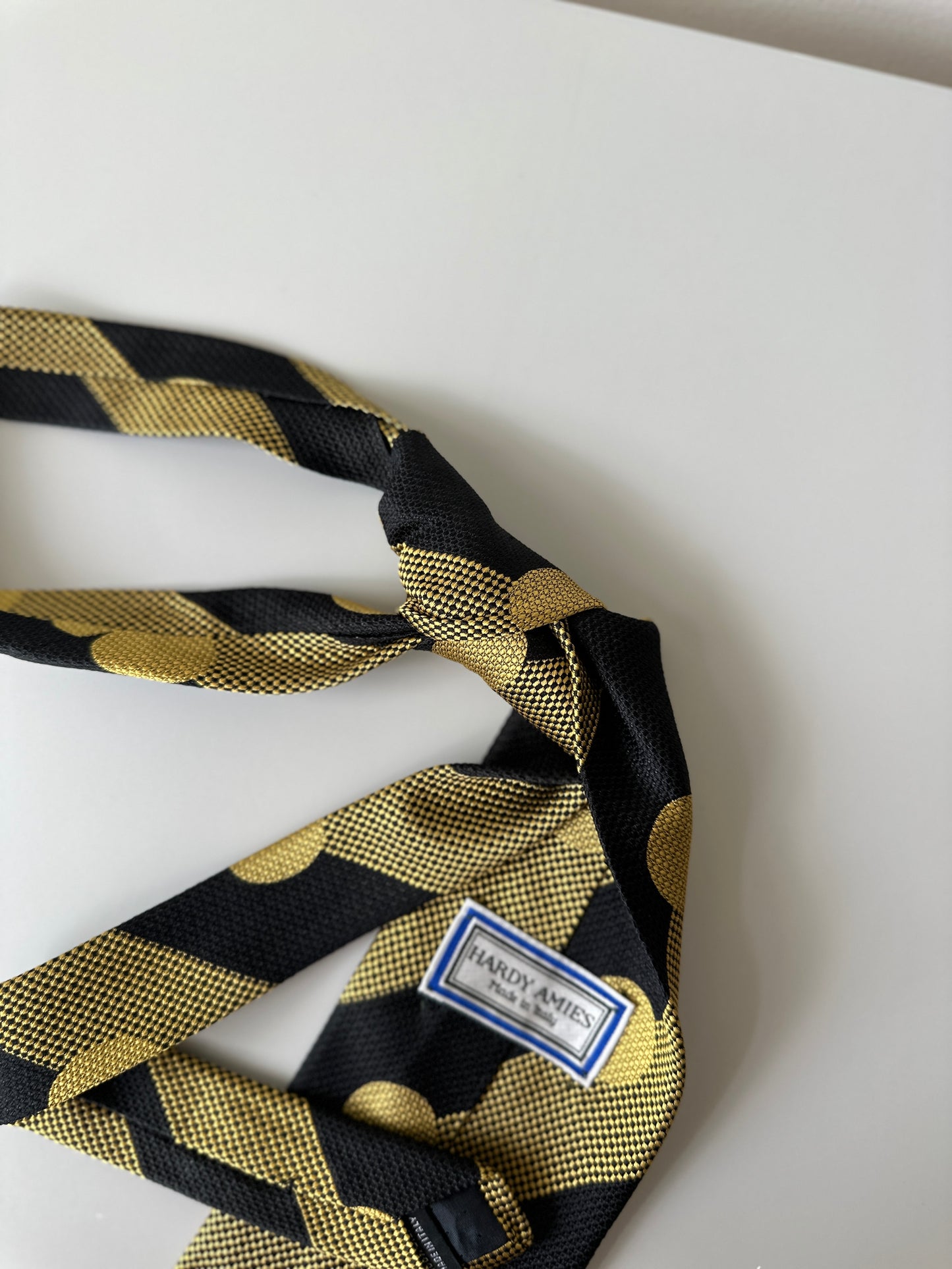 yellow/black polka dot tie