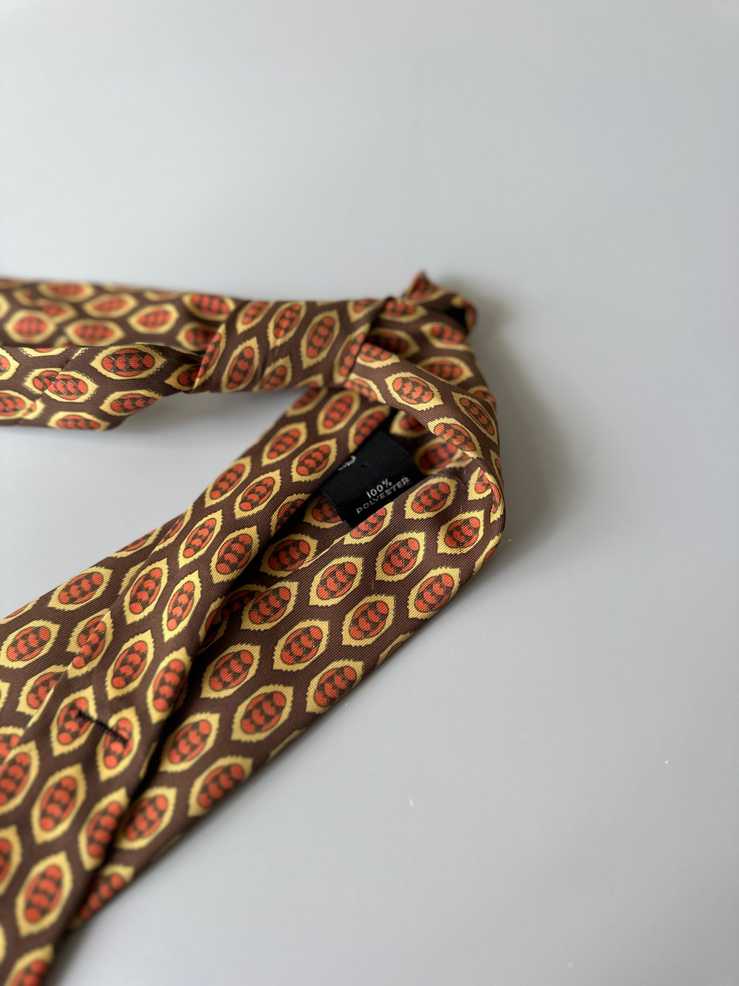 orange/brown diamond tie