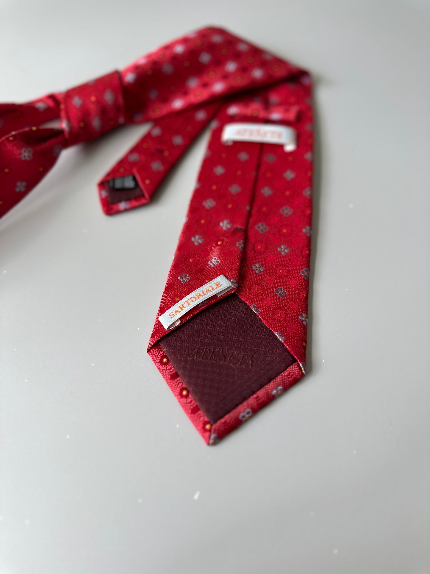 red with baby blue flowers tie
