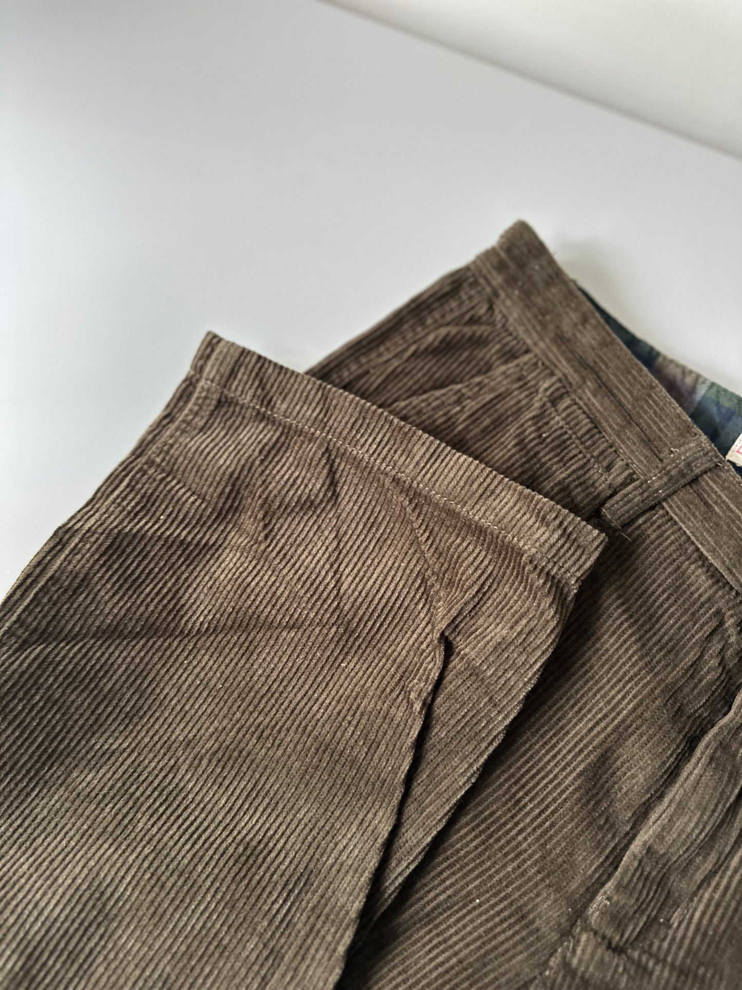 khaki corduroy trousers