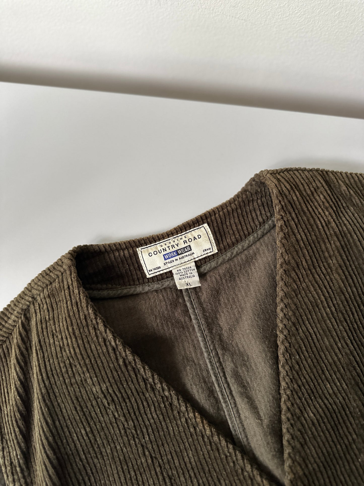 khaki green button up corduroy vest
