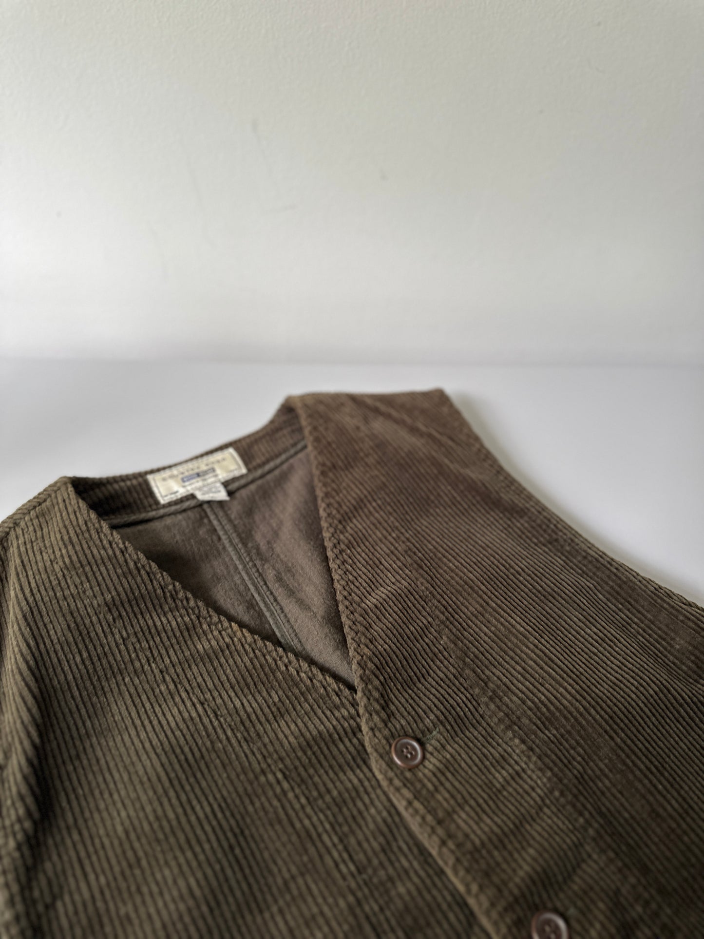 khaki green button up corduroy vest