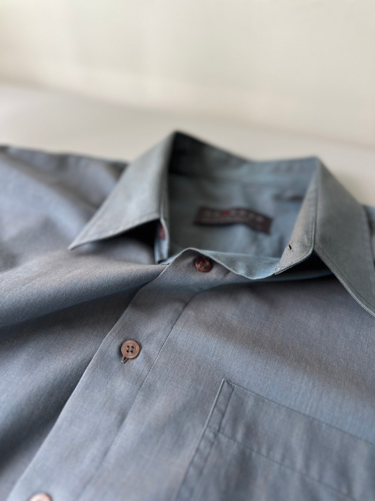 blue opaque button up