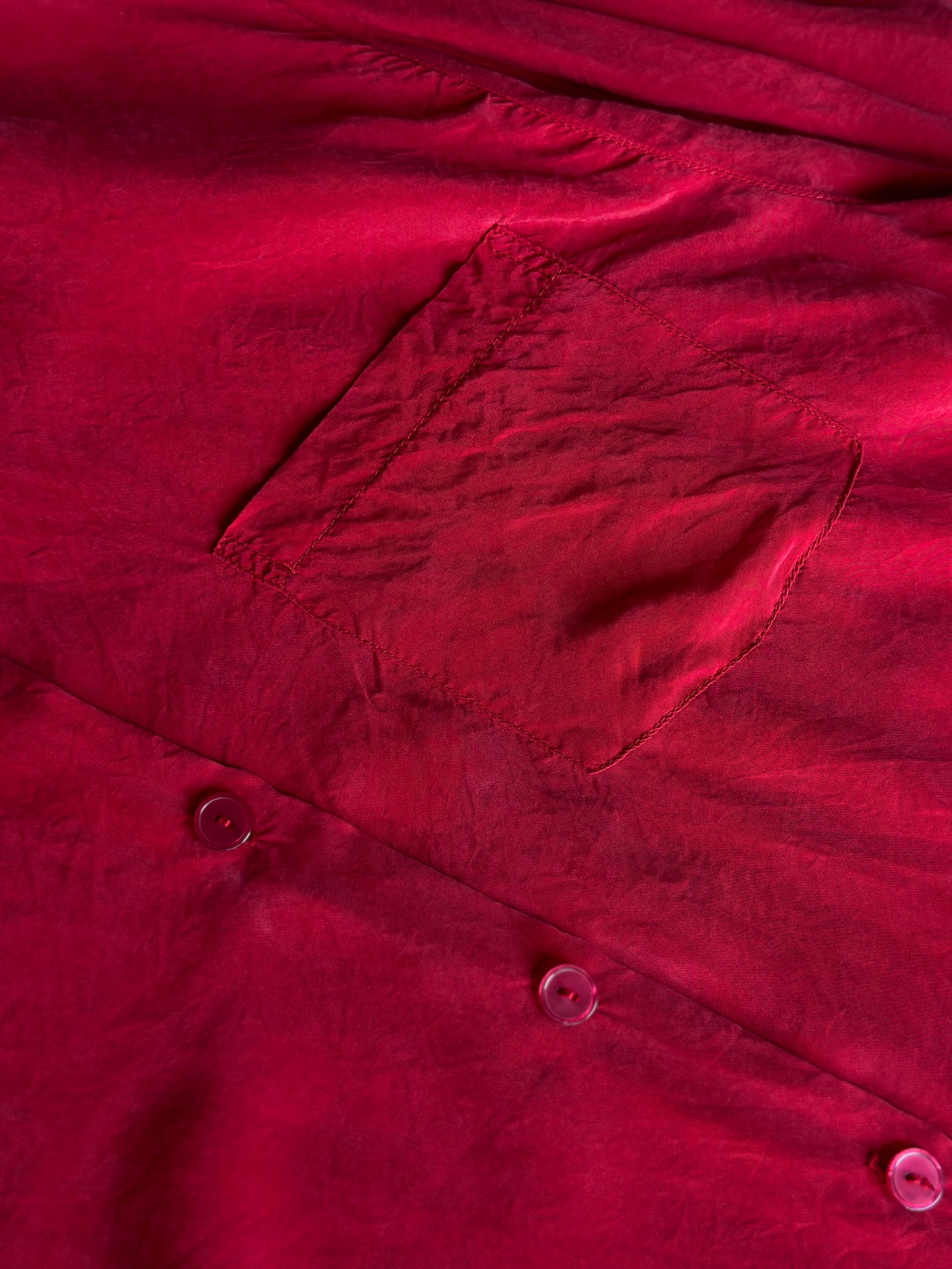 vibrant red silk shirt