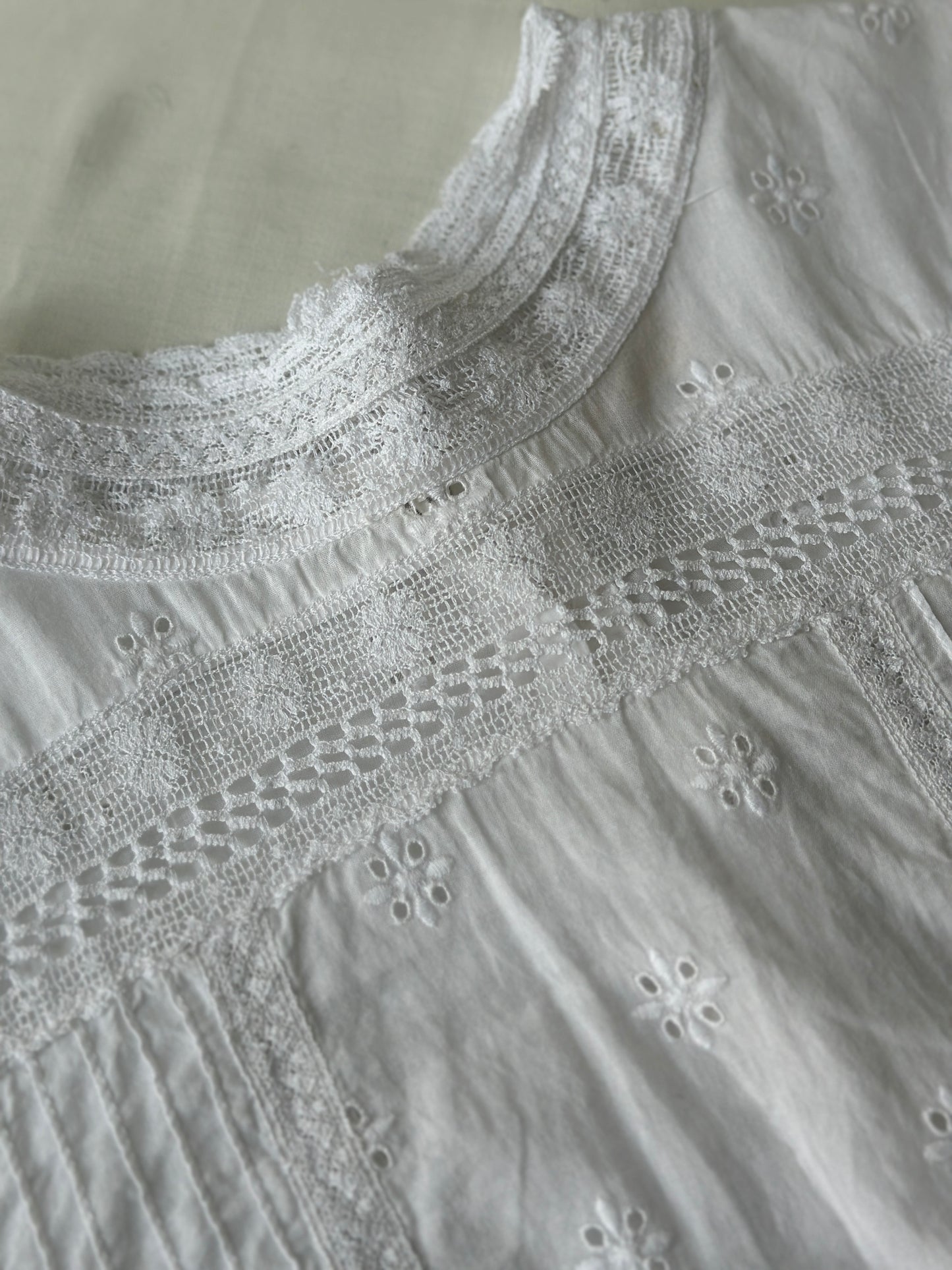 white embroidered cotton blouse