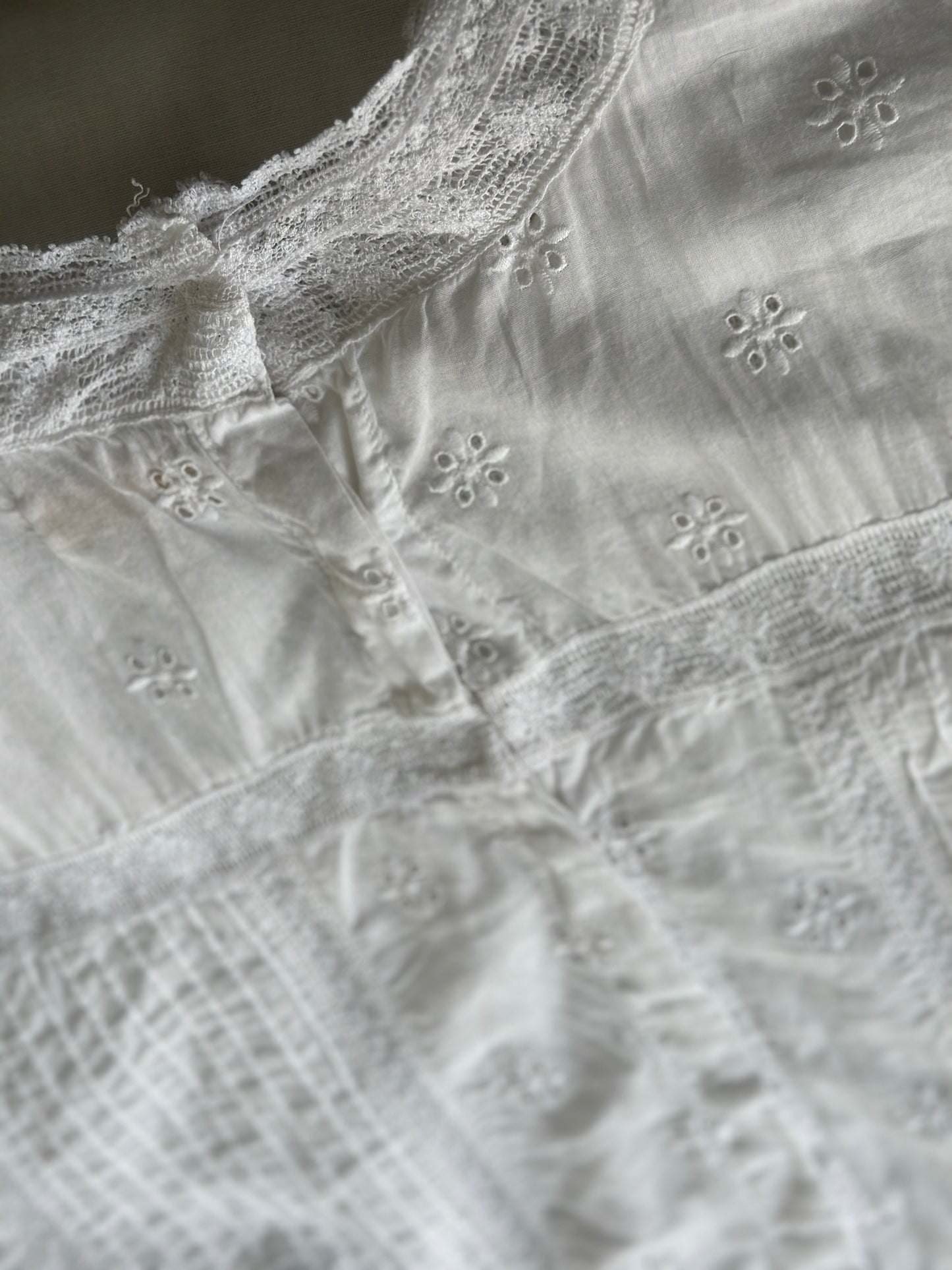 white embroidered cotton blouse