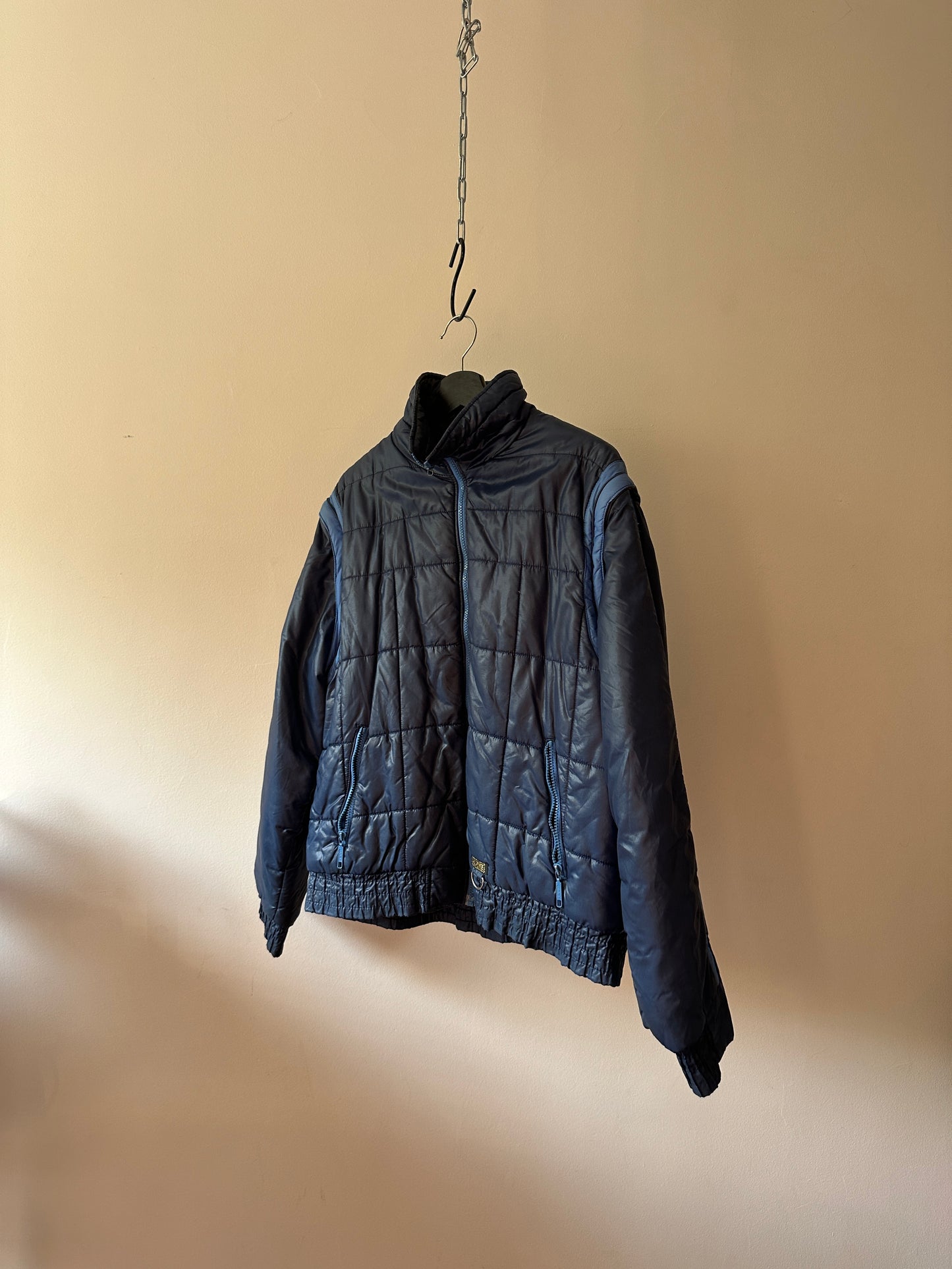 puffer jacket with detachable sleeves