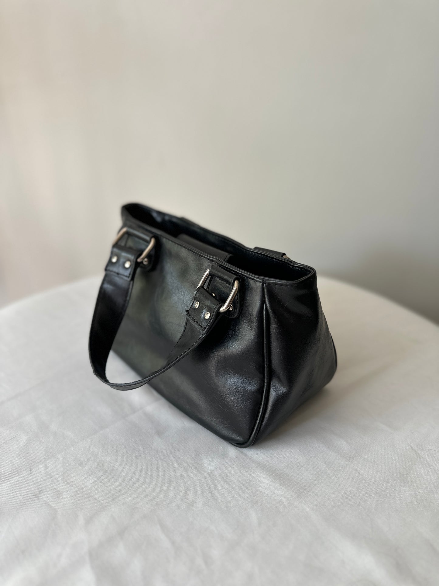 black buckle handbag