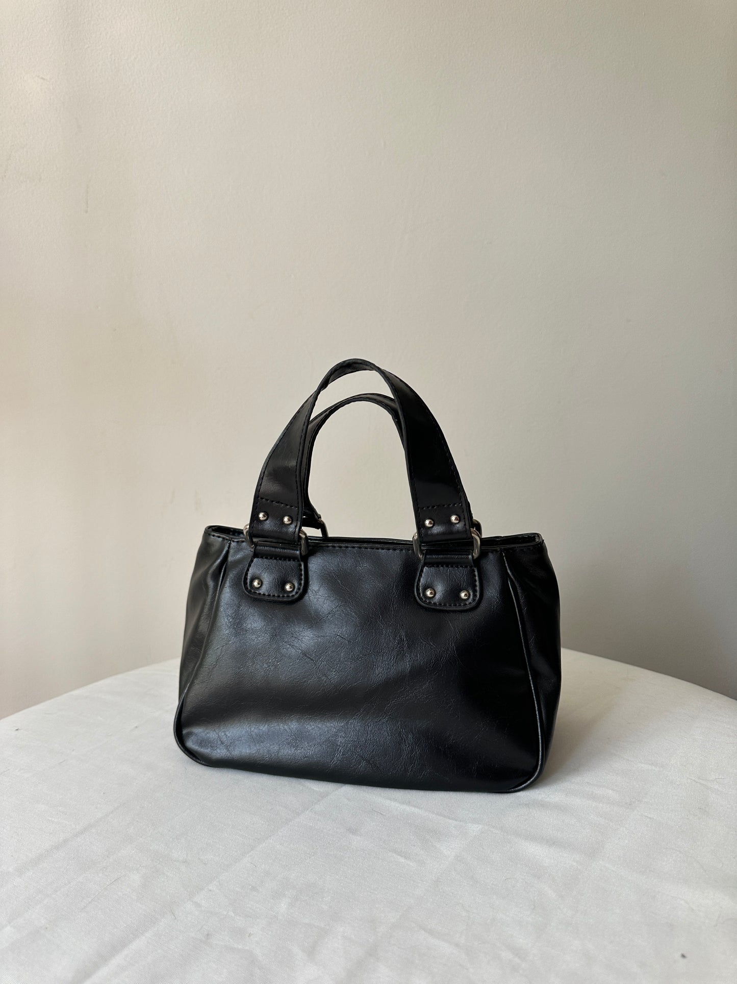 black buckle handbag