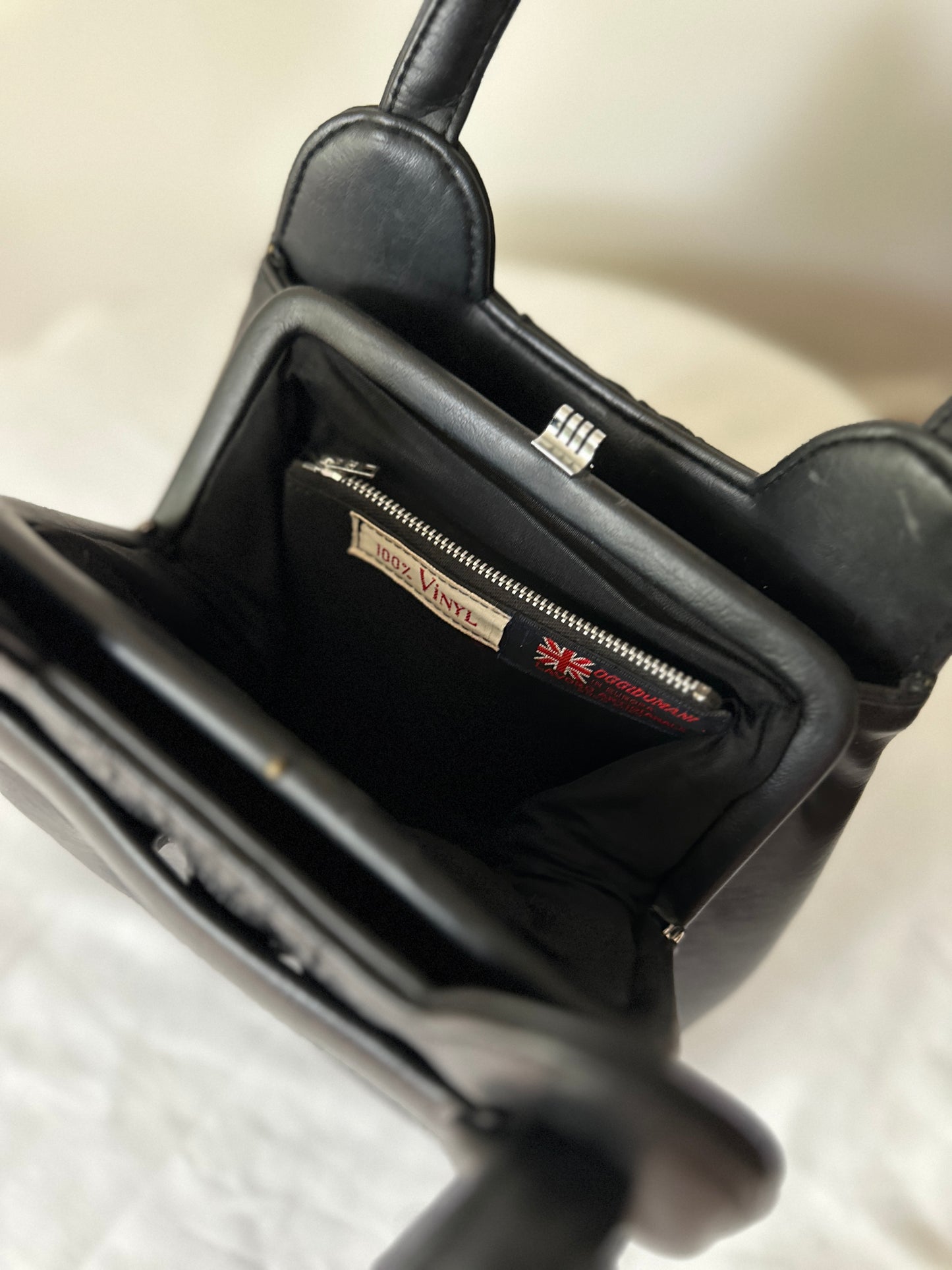 black vinyl handbag