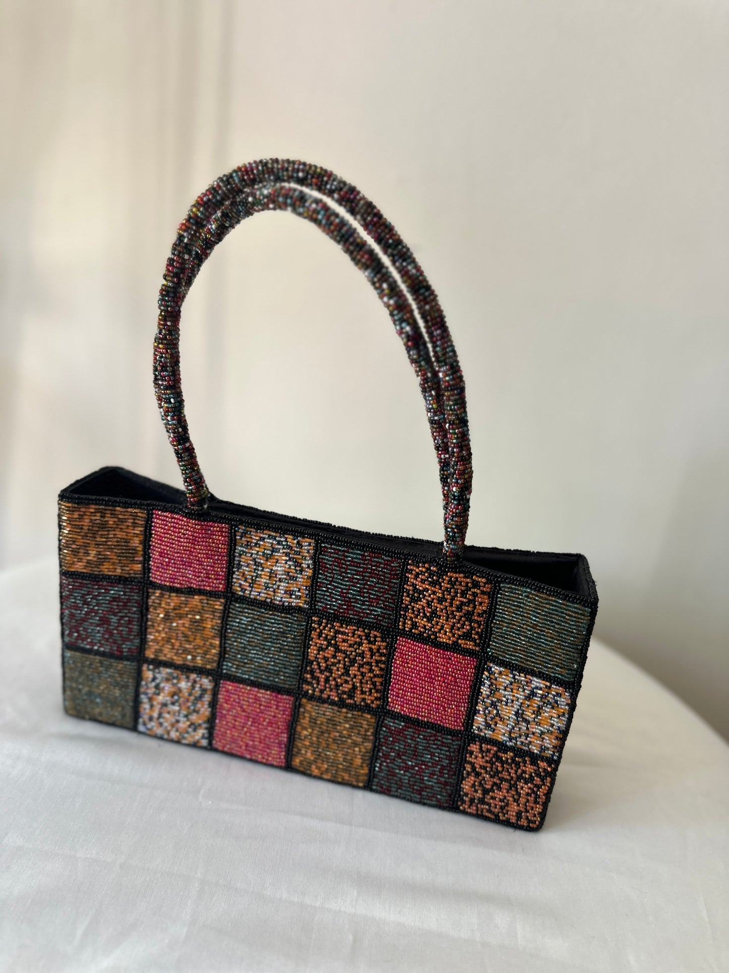 checkered beaded handbag