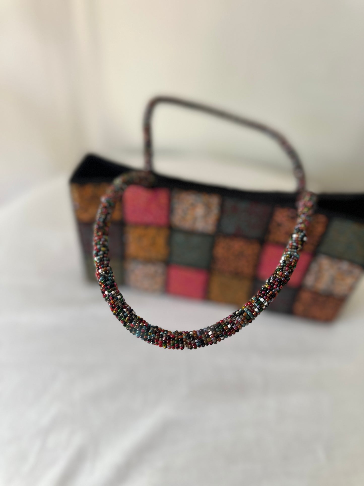 checkered beaded handbag