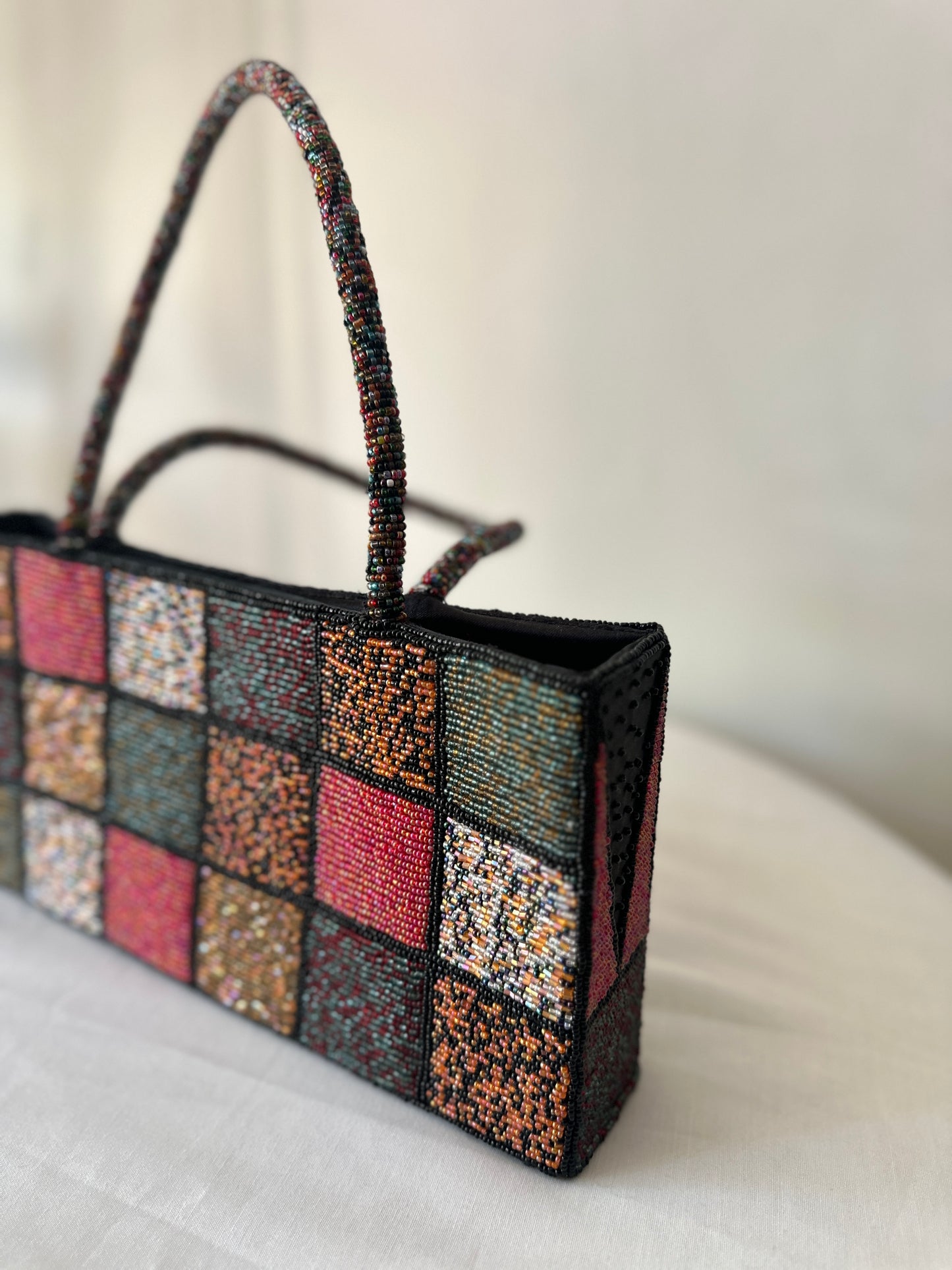 checkered beaded handbag