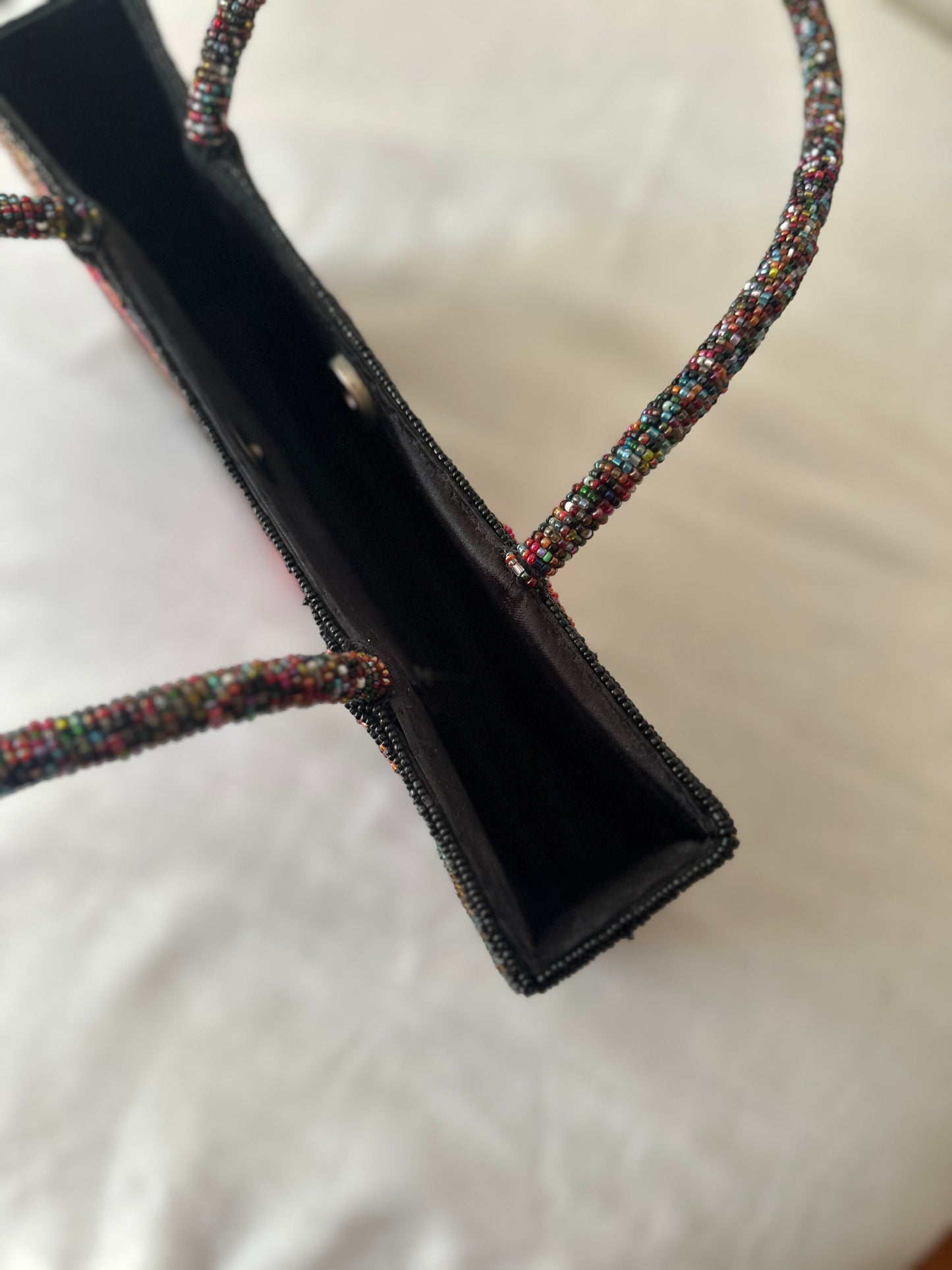 checkered beaded handbag