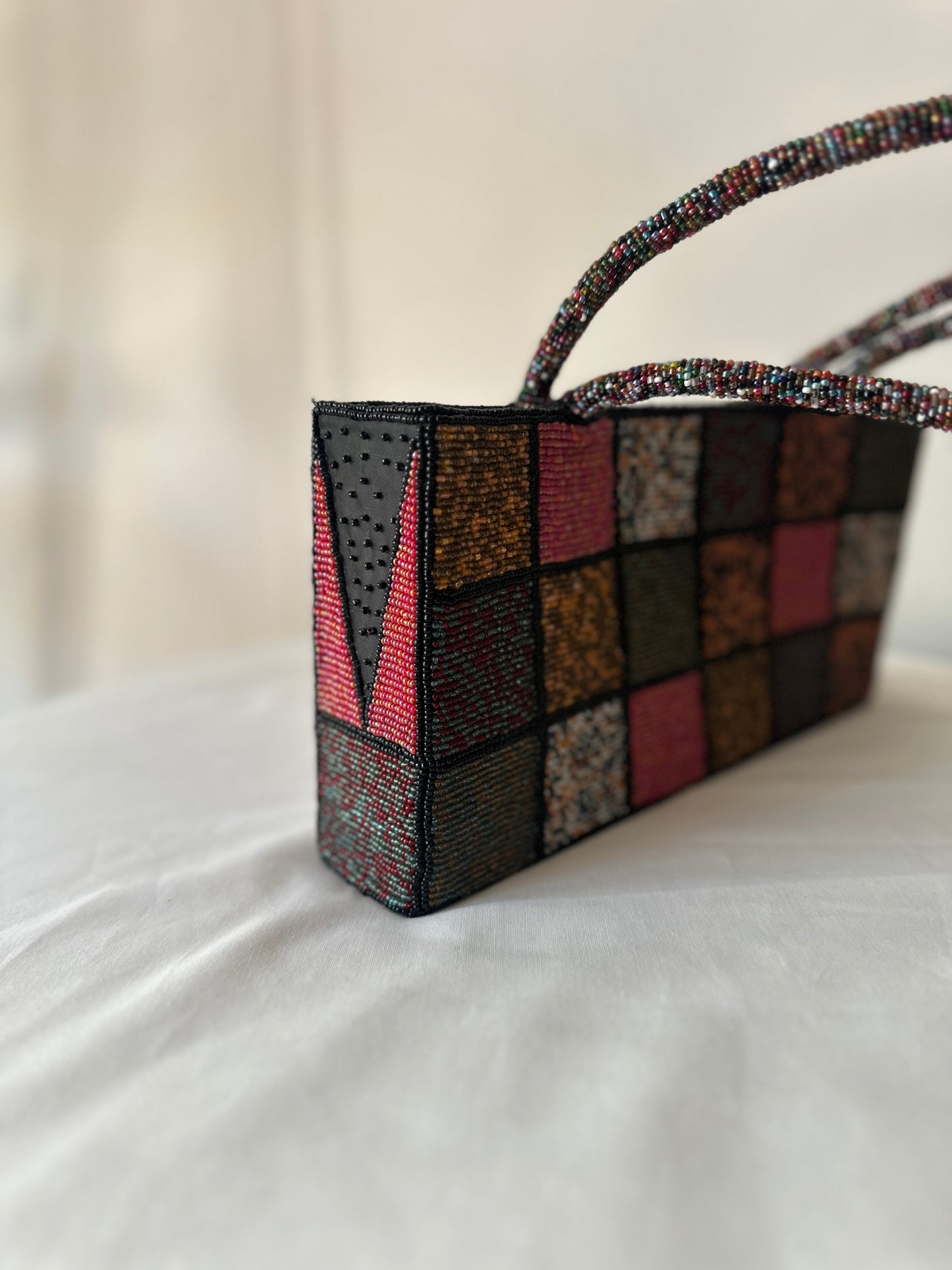 checkered beaded handbag