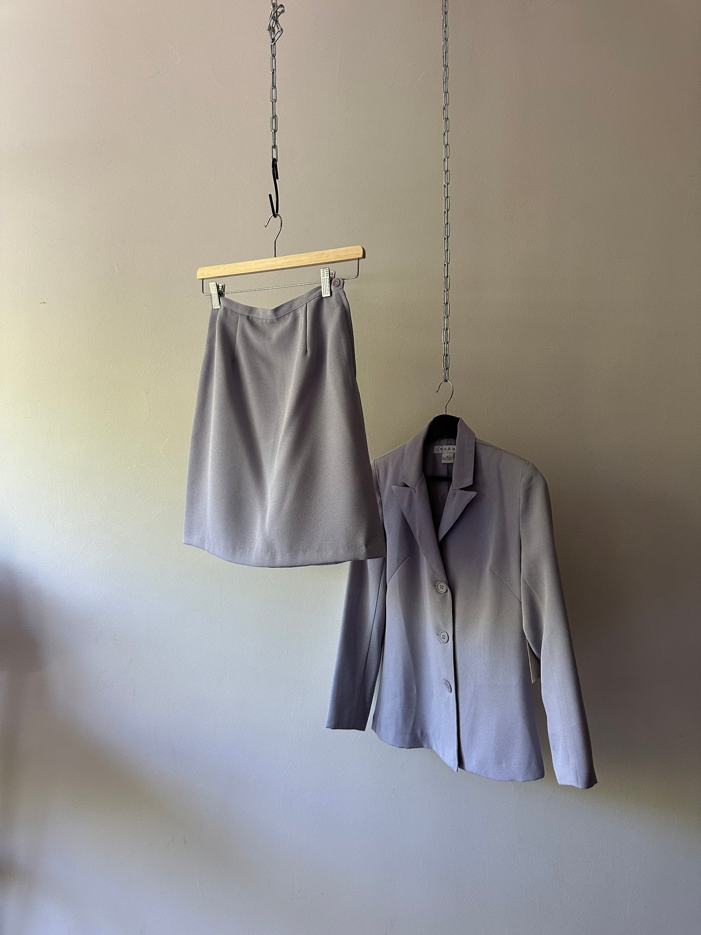 lilac coloured three piece suit