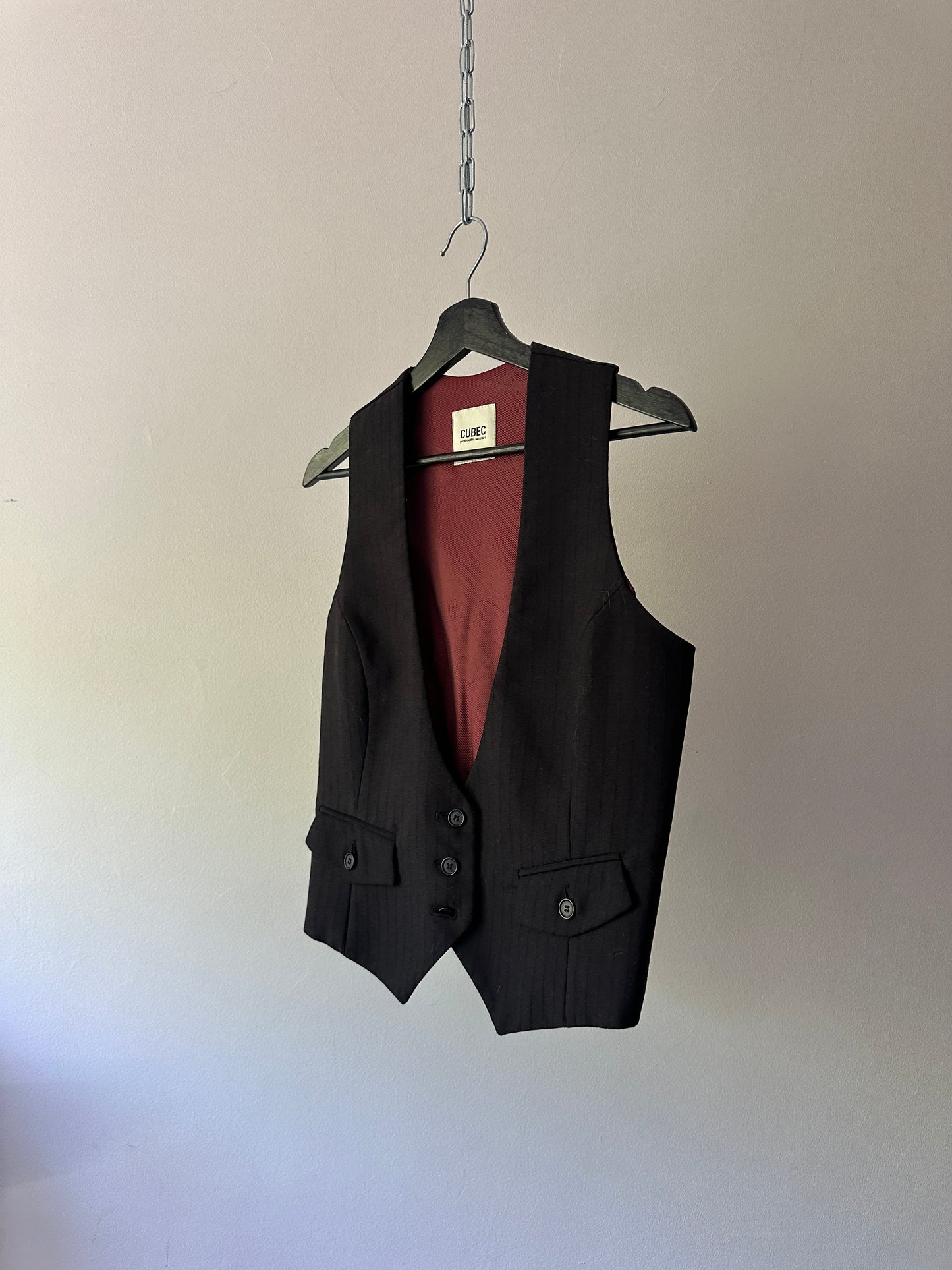 low cut black waistcoat