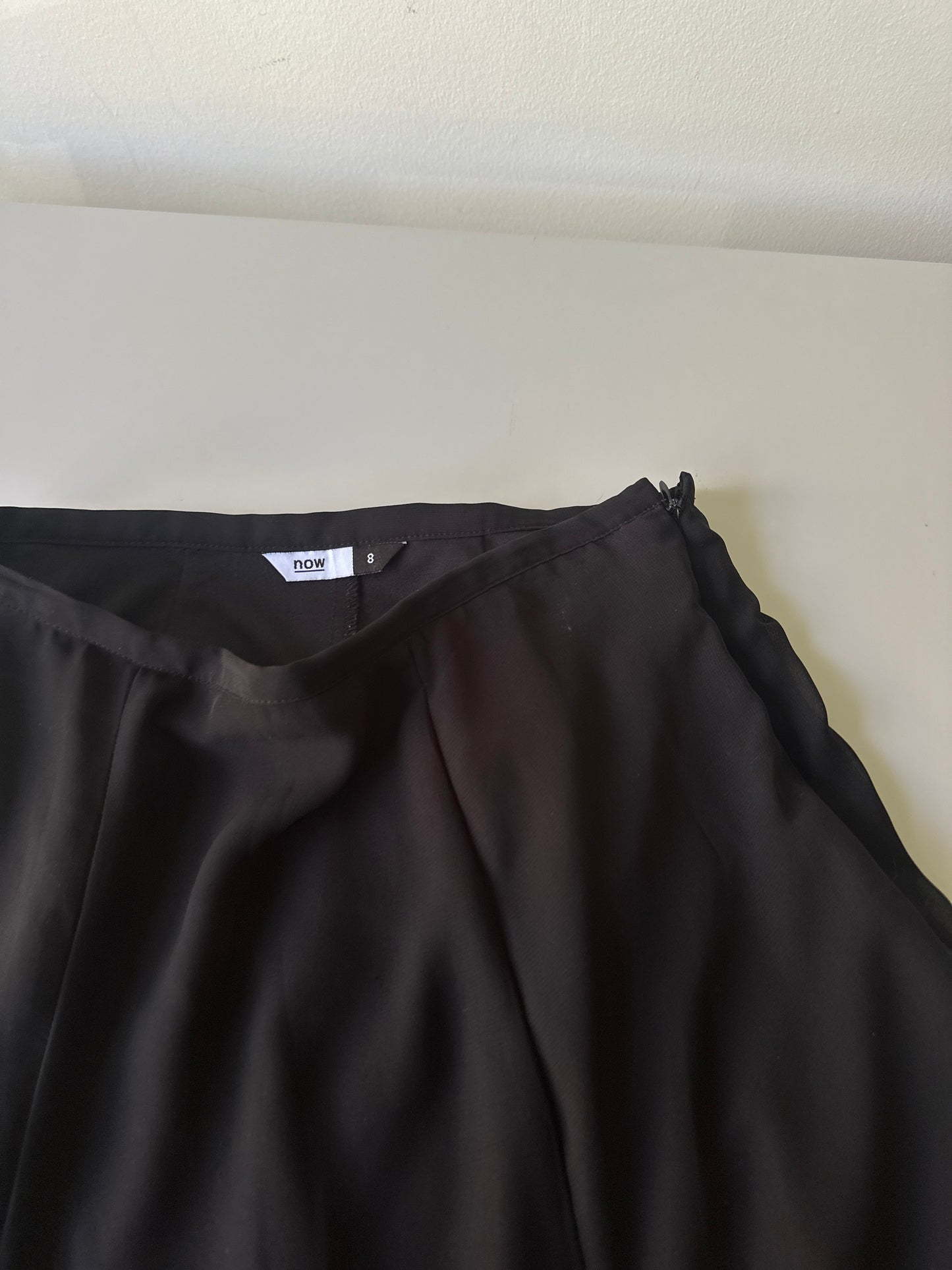 black ruffled midi skirt