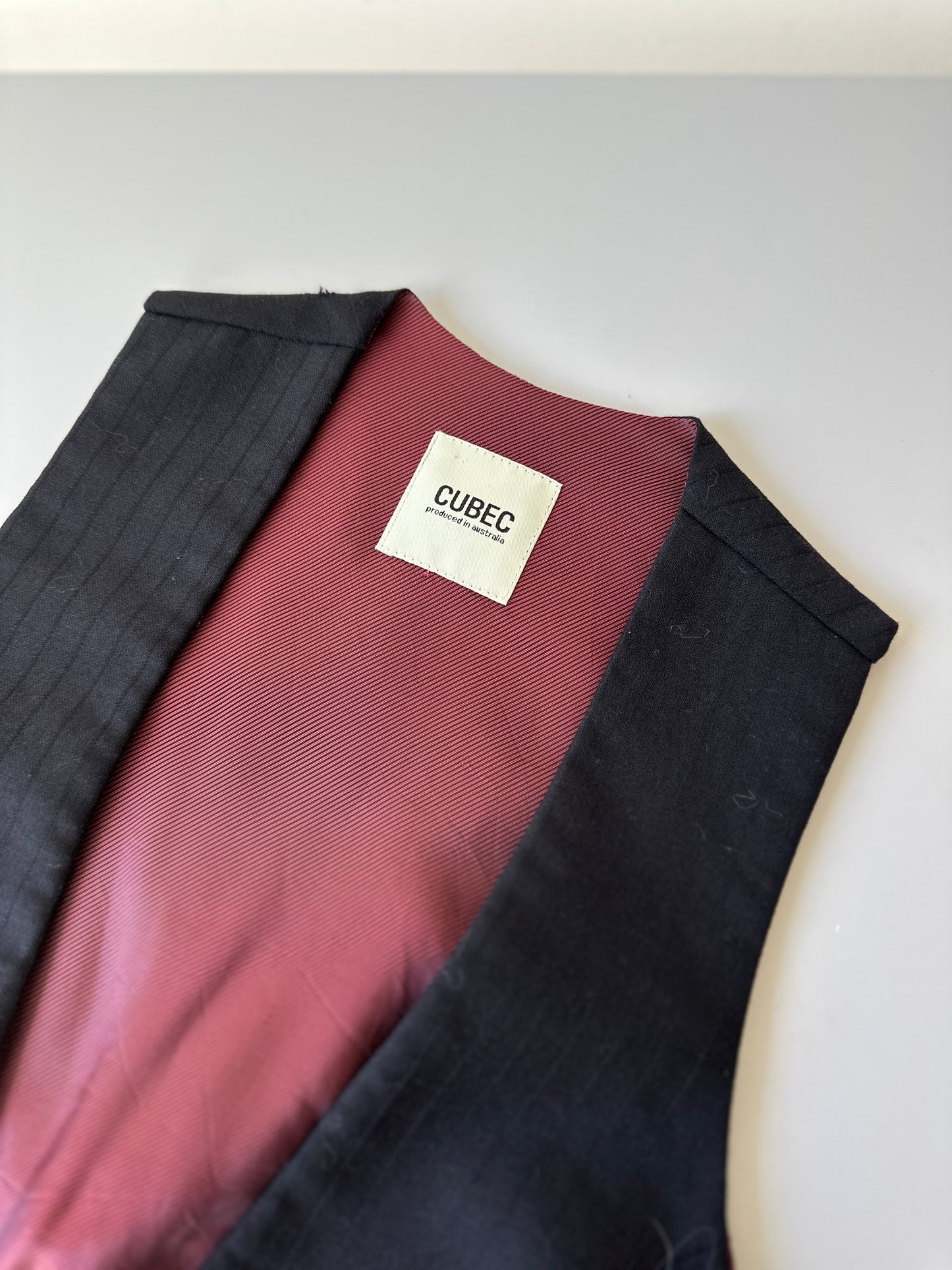 low cut black waistcoat