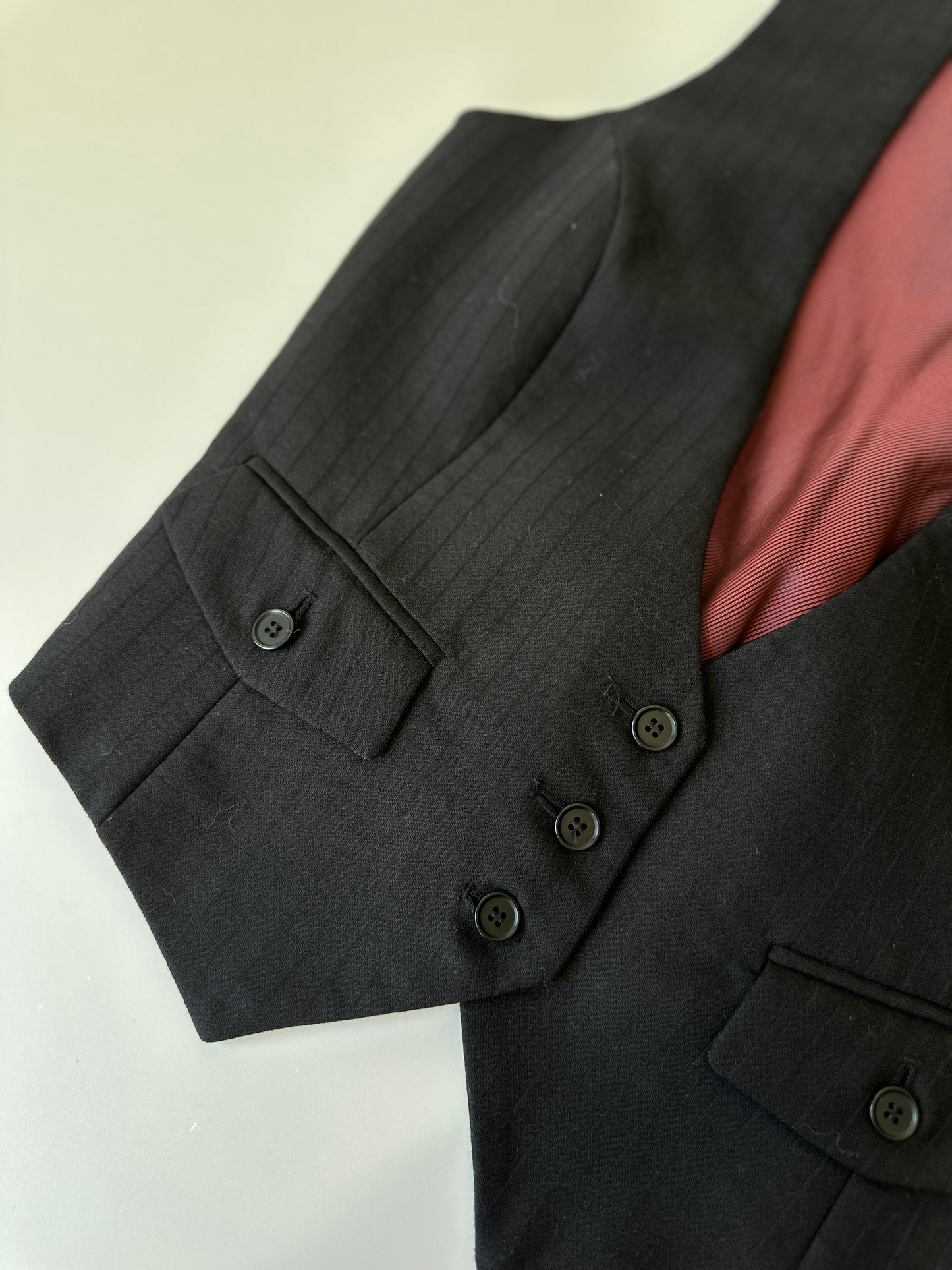 low cut black waistcoat