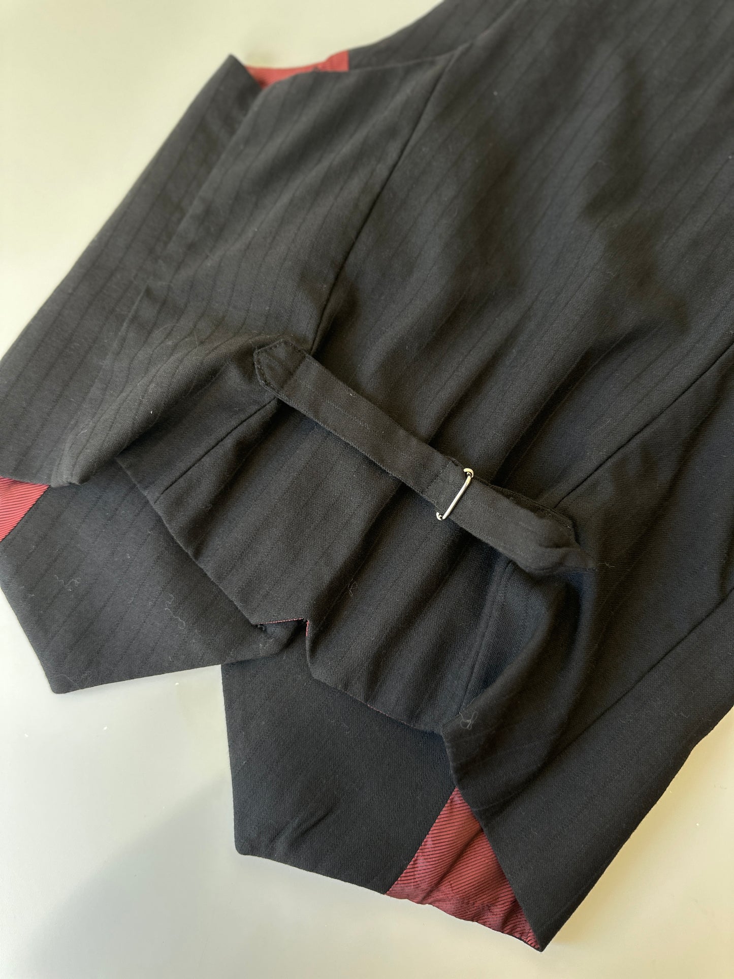 low cut black waistcoat