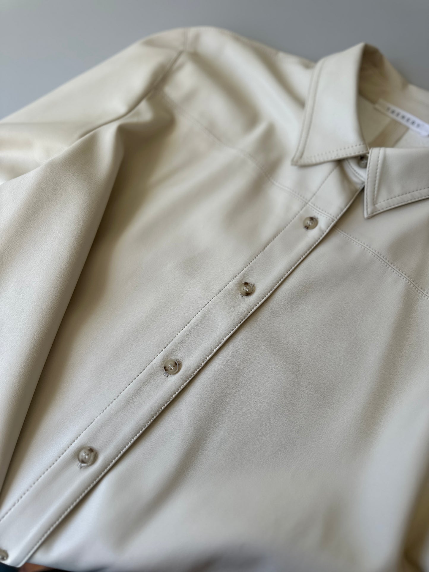 cream faux leather button up