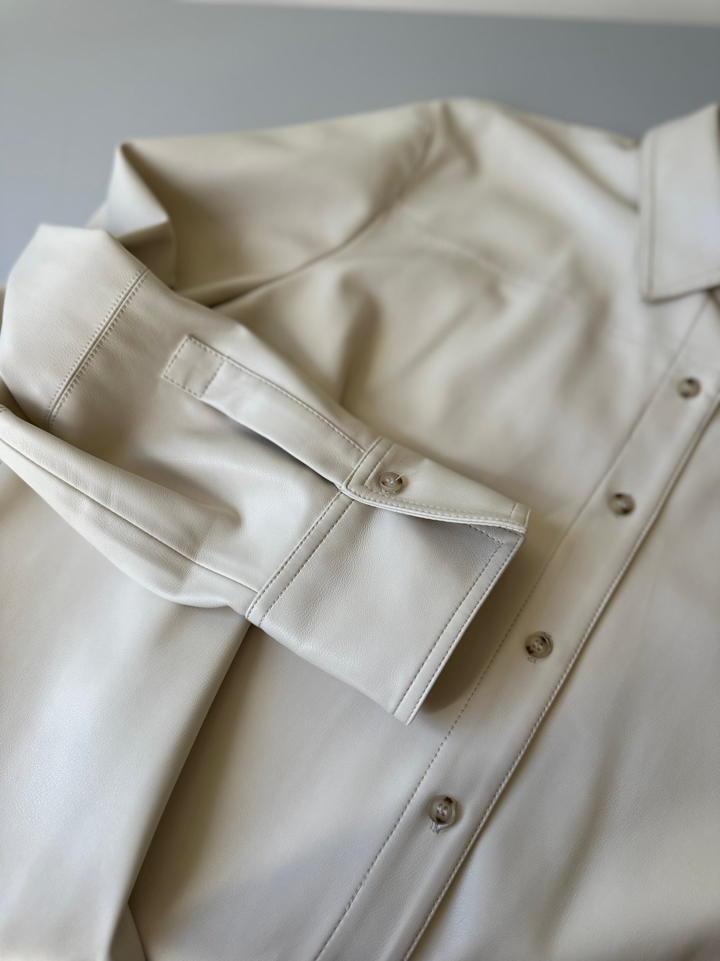 cream faux leather button up
