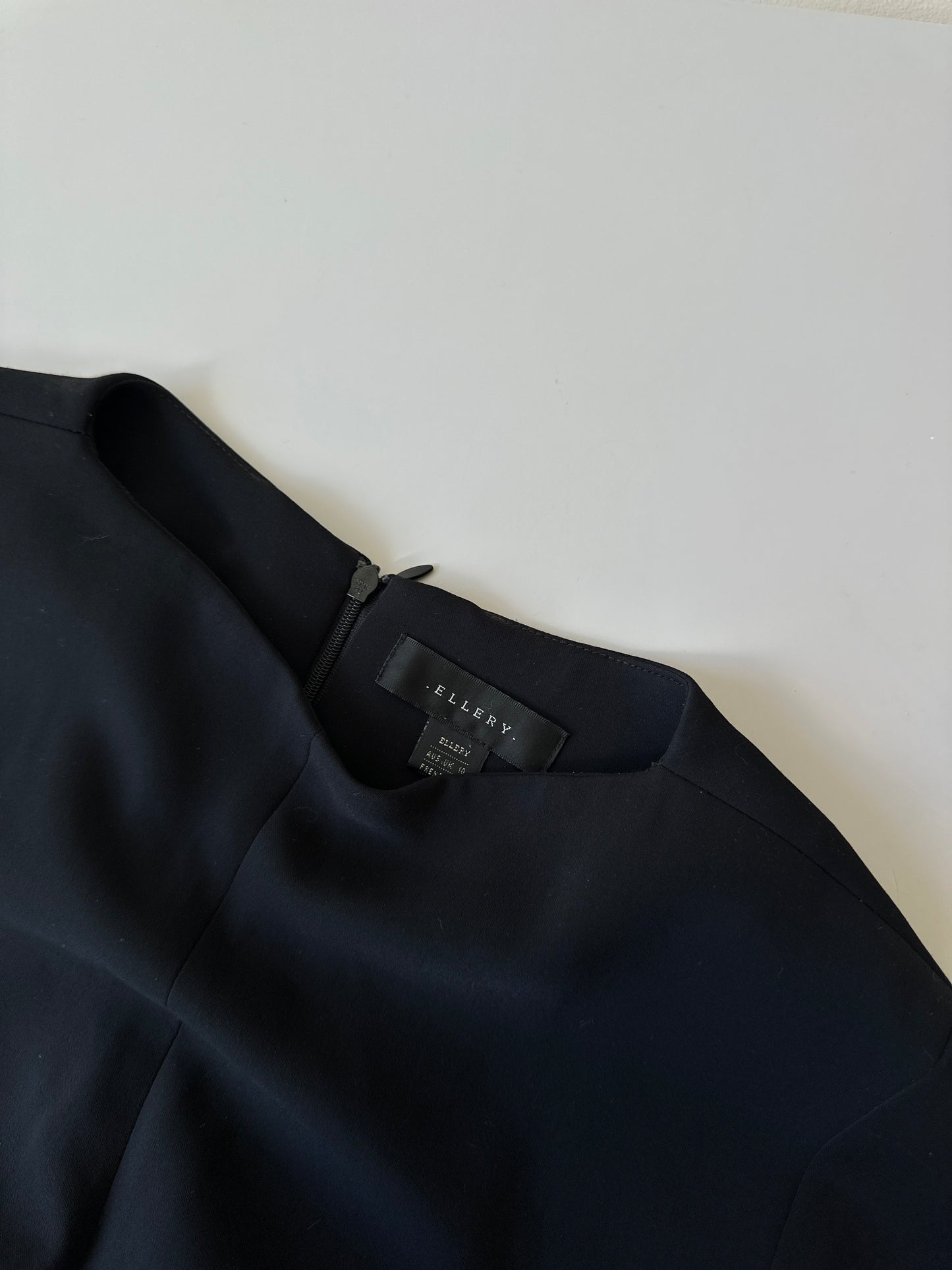 fitted black flare sleeve blouse