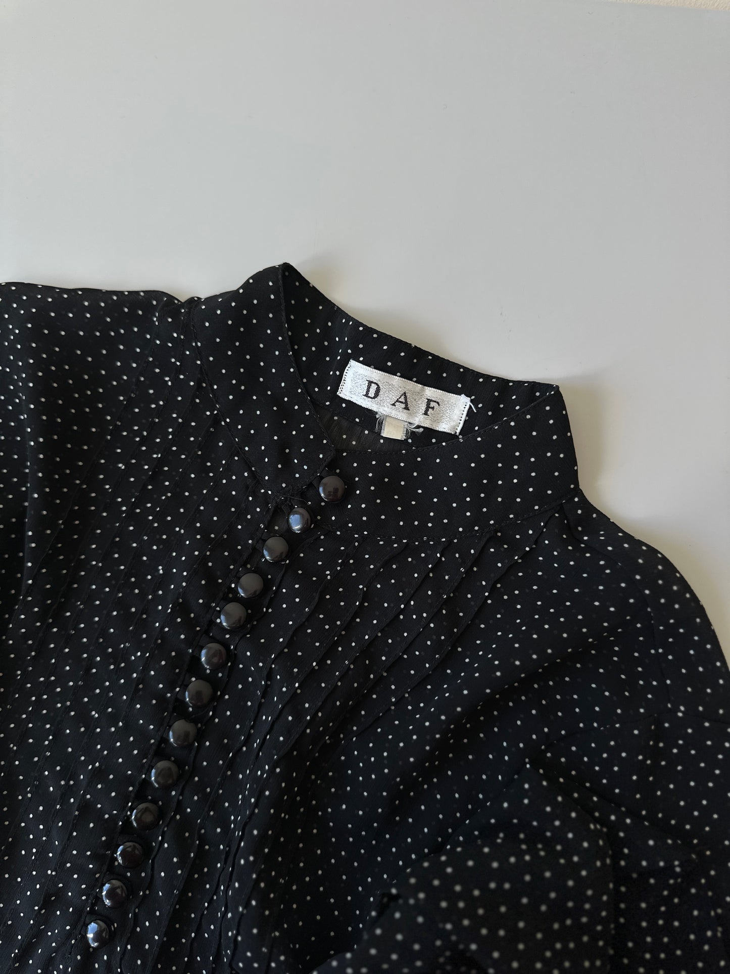 sheer polka-dot button up blouse