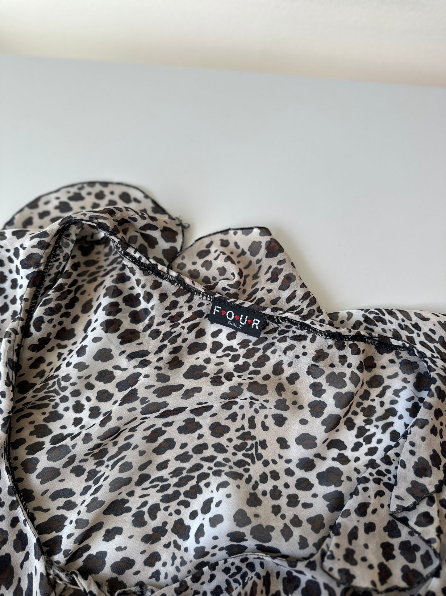 sheer leopard print ruffled blouse