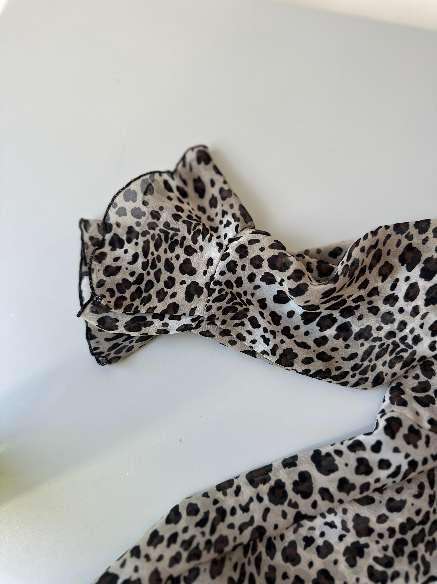 sheer leopard print ruffled blouse