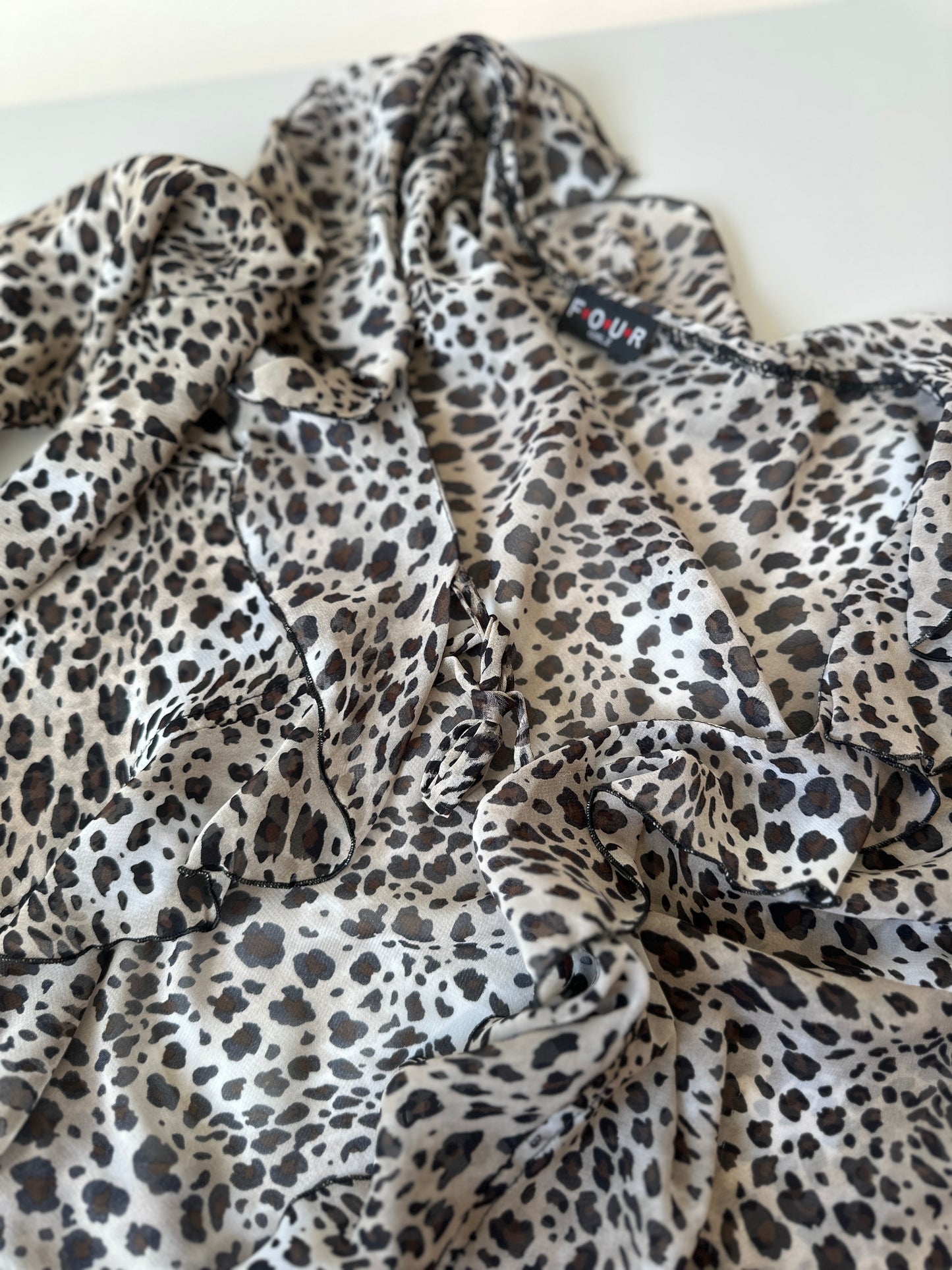 sheer leopard print ruffled blouse