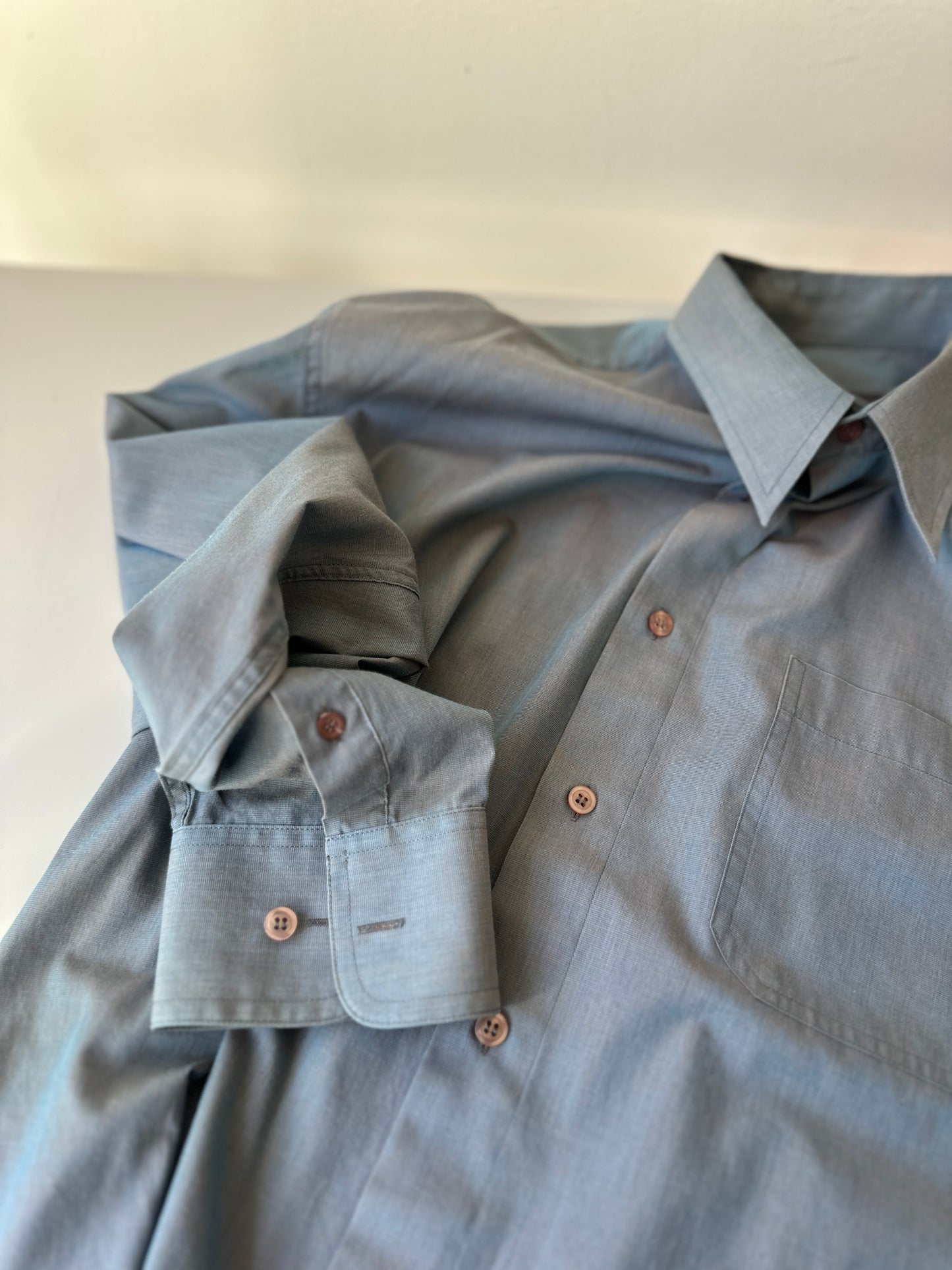 blue opaque button up