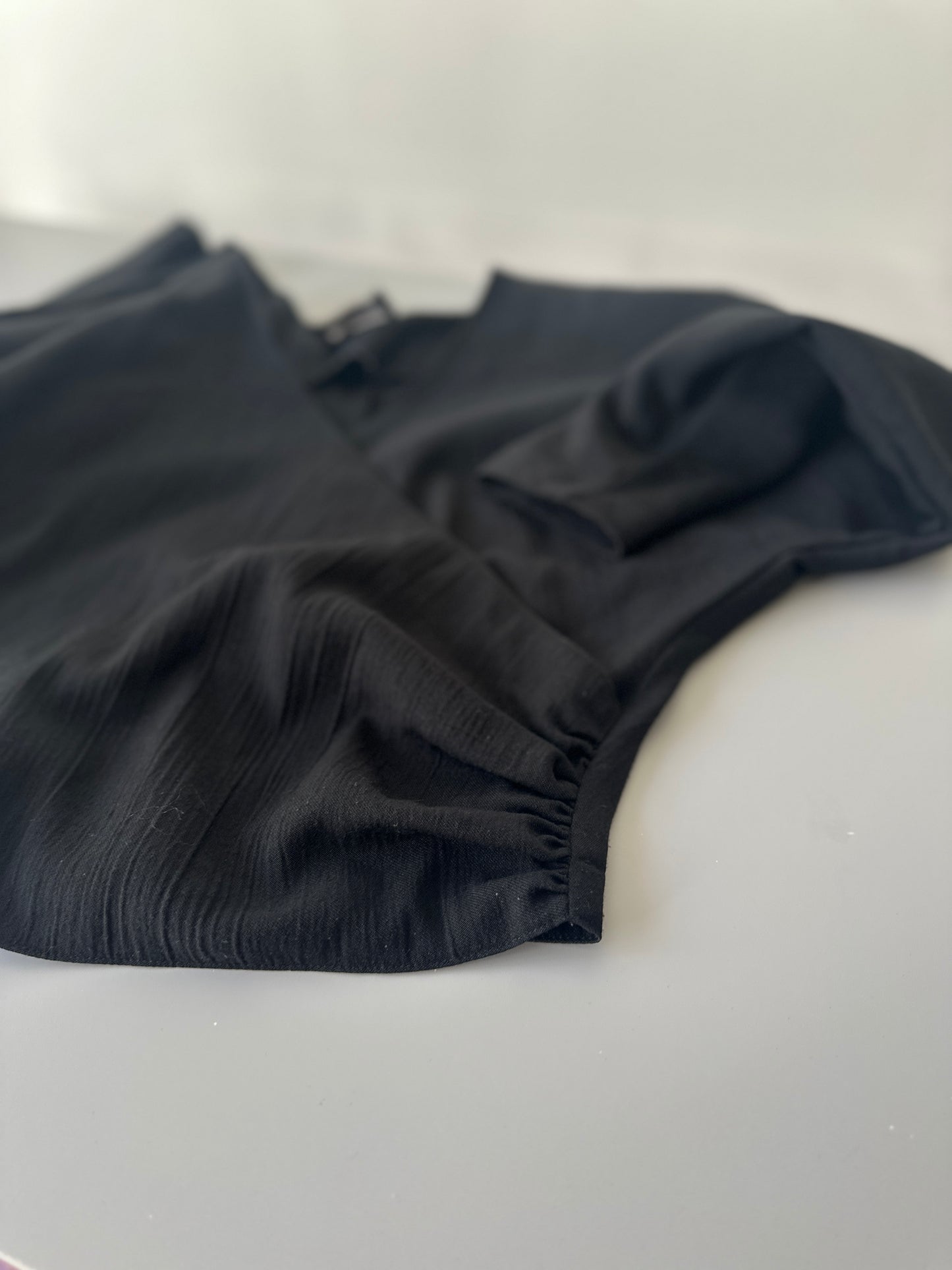cropped cross over long sleeve blouse