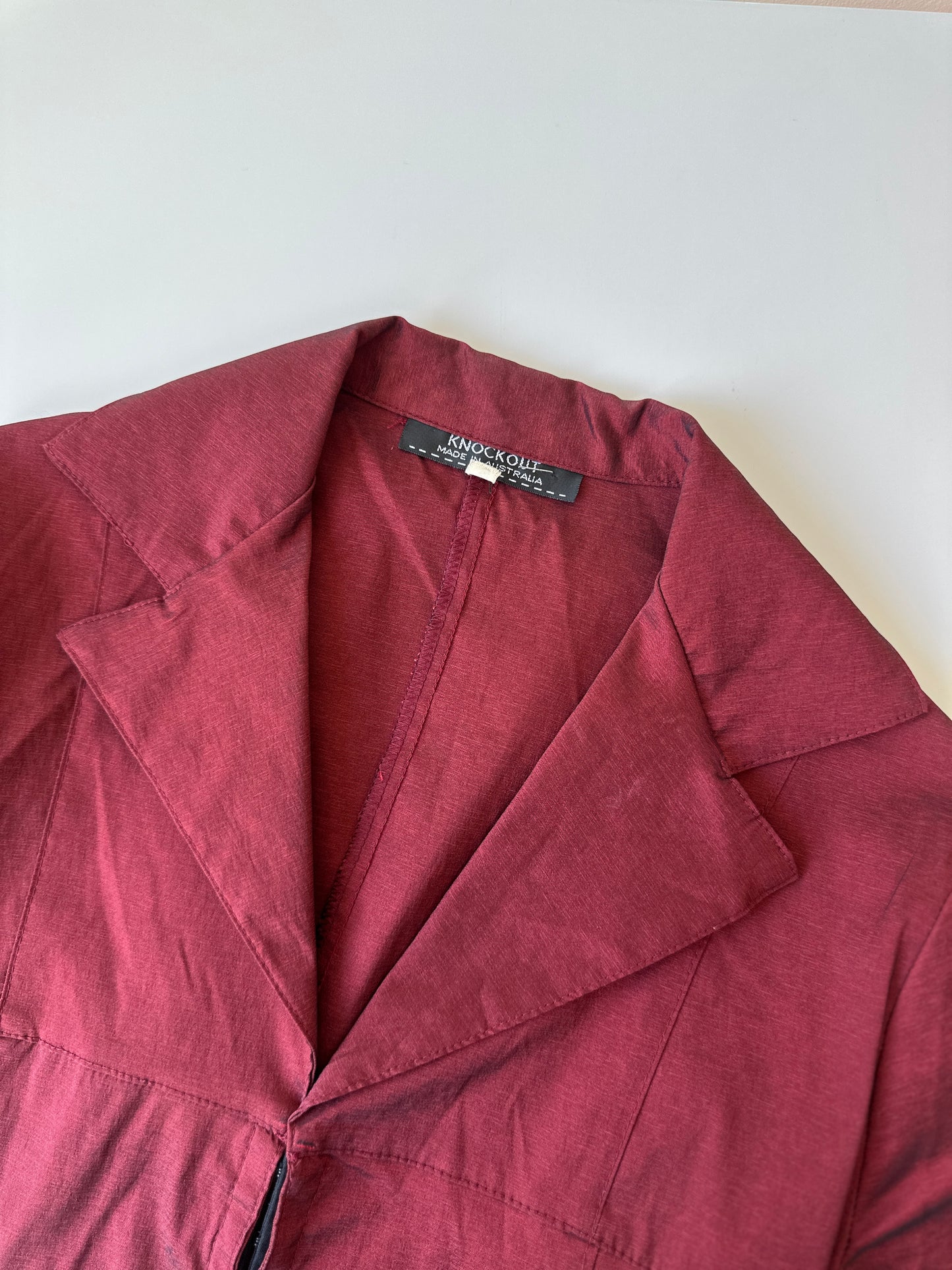 red opaque longline jacket