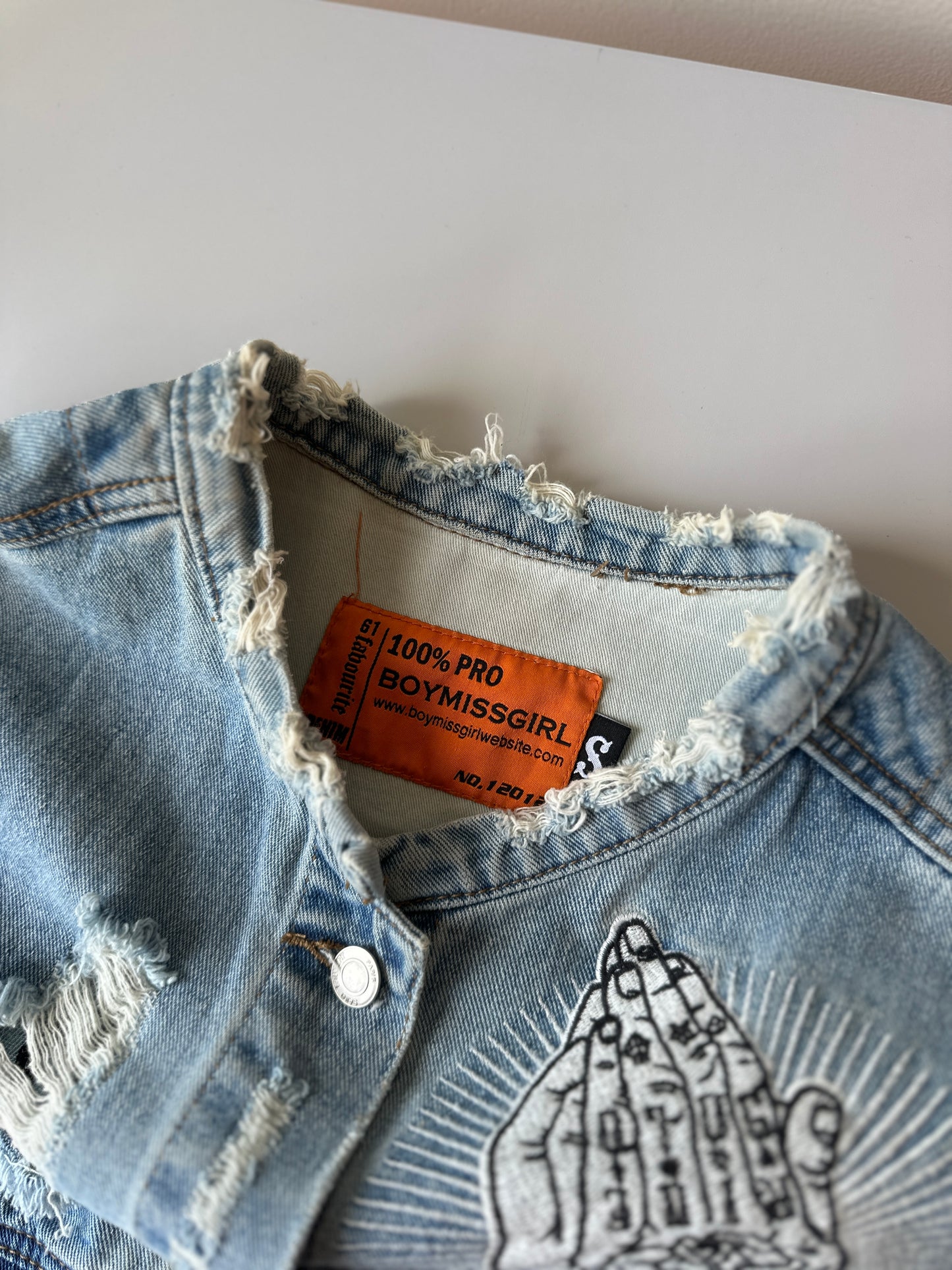 distressed denim jacket