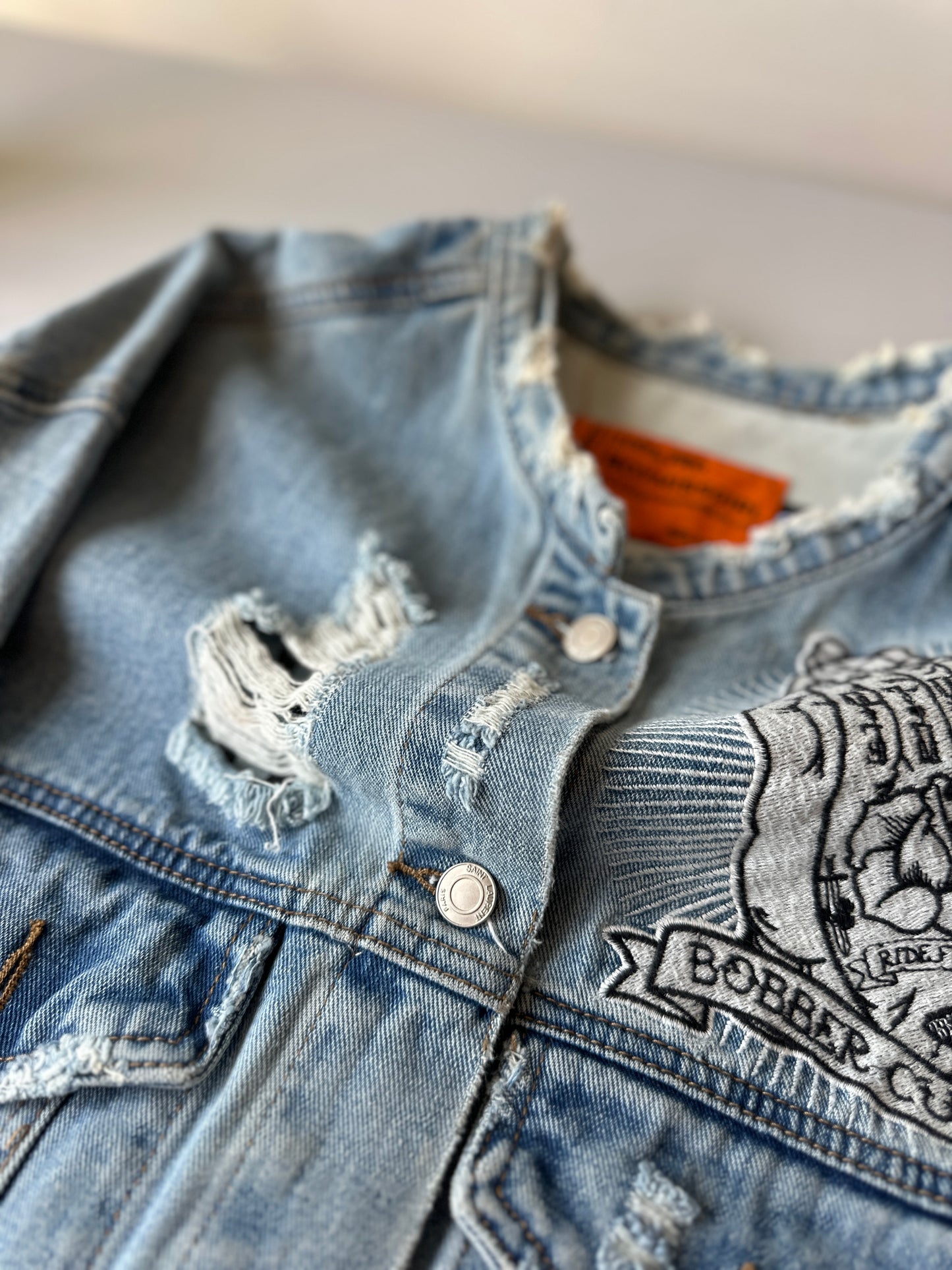 distressed denim jacket