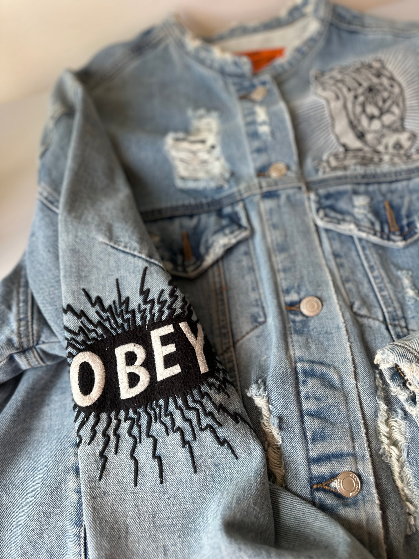 distressed denim jacket
