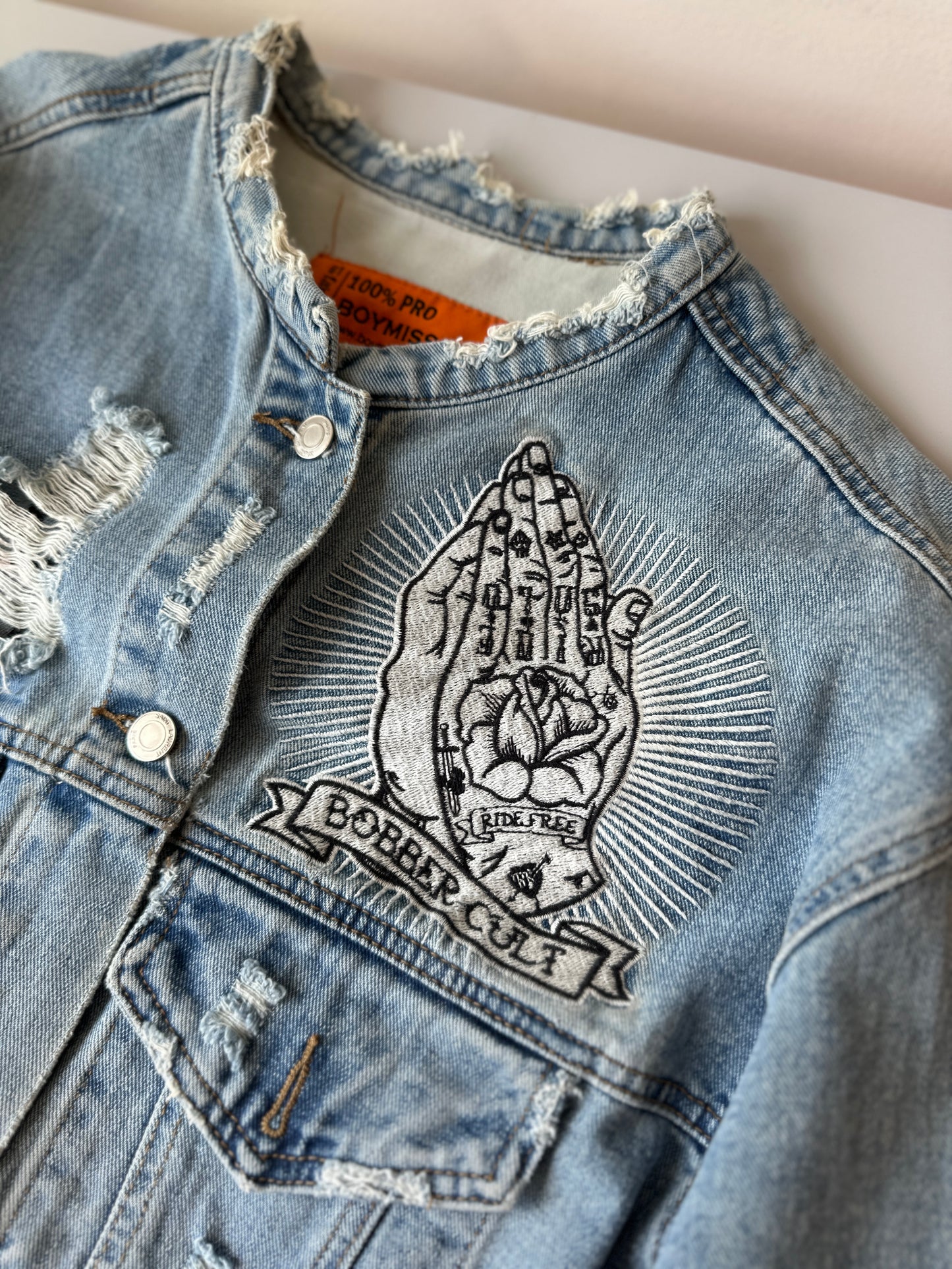 distressed denim jacket