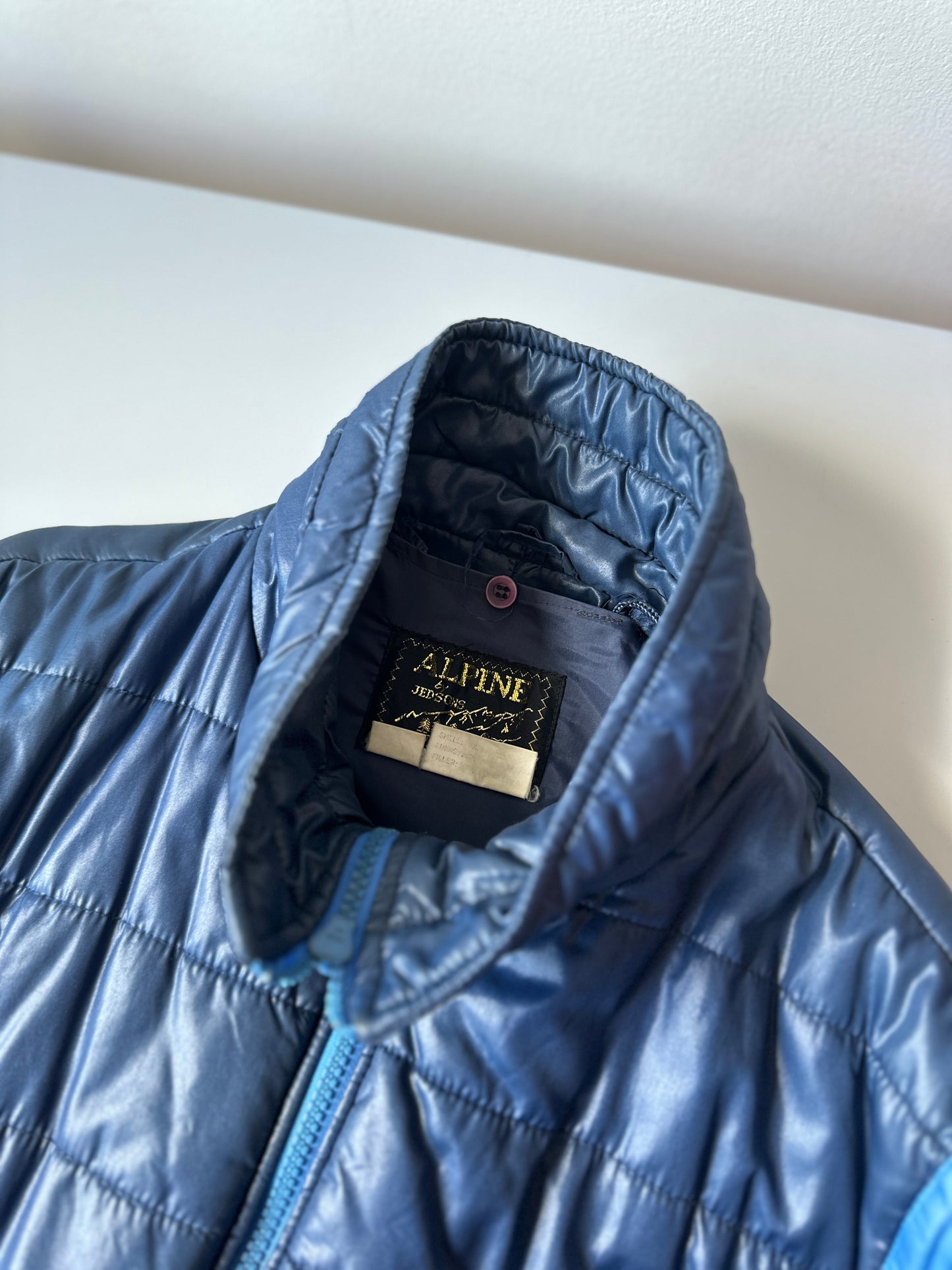 puffer jacket with detachable sleeves