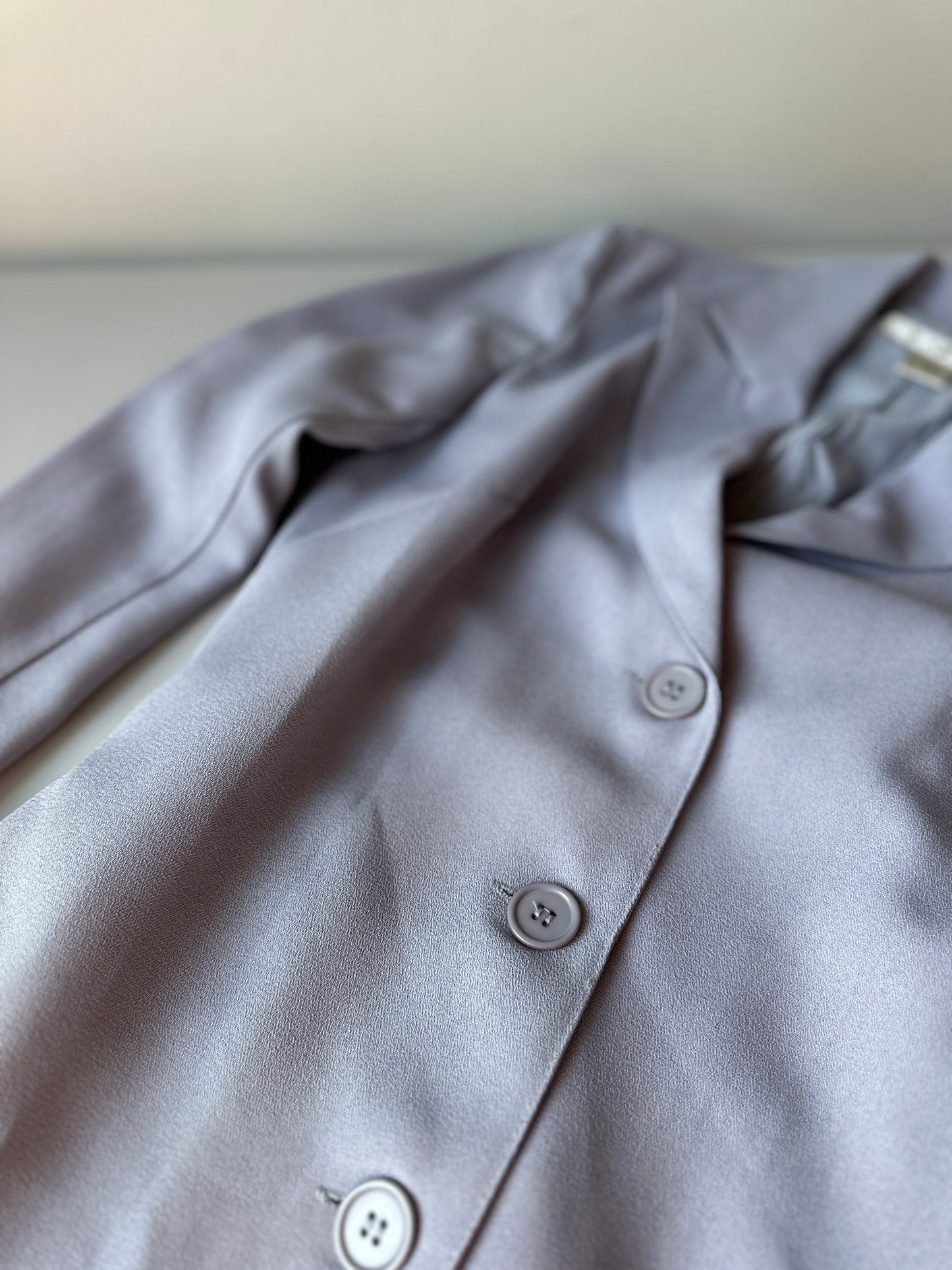 lilac coloured three piece suit