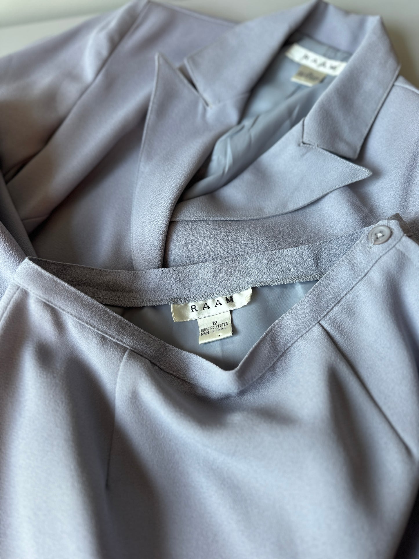 lilac coloured three piece suit