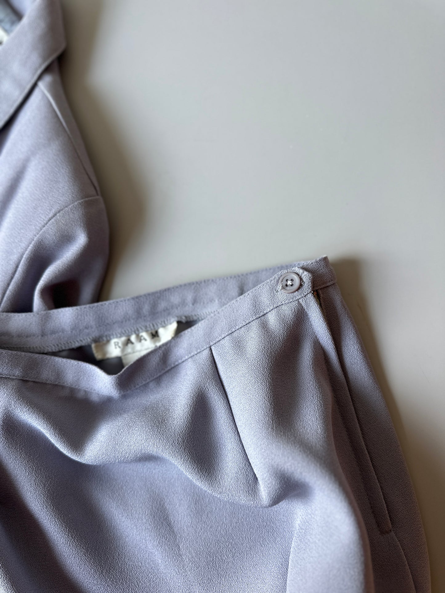 lilac coloured three piece suit