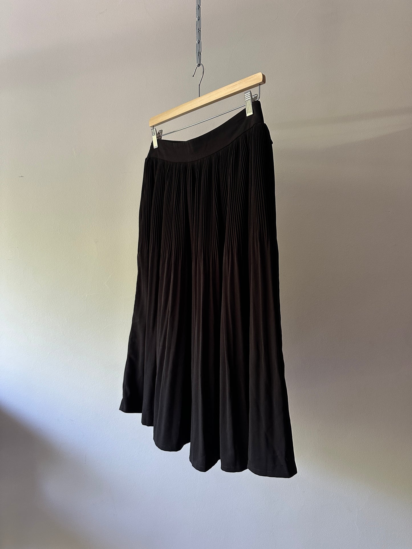 black pleated midi skirt