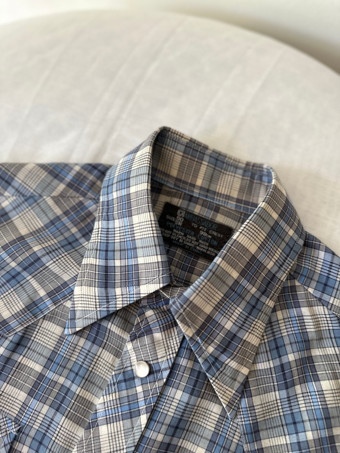 blue cross stitch button up