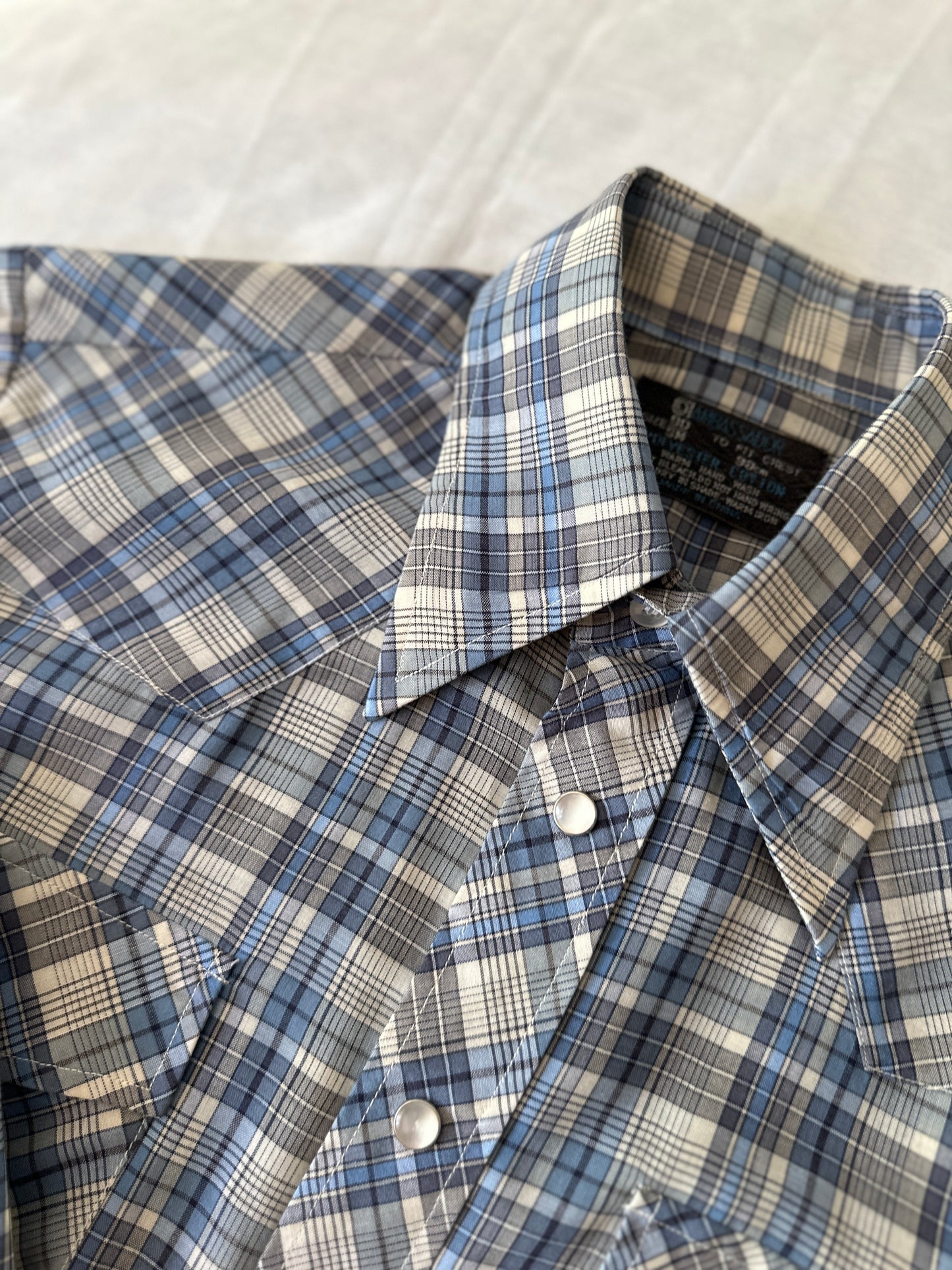 blue cross stitch button up