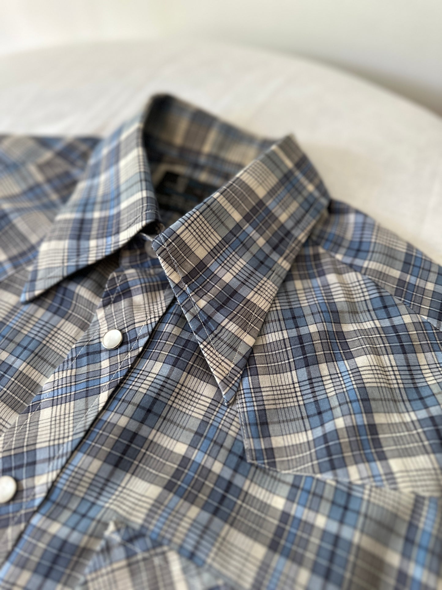 blue cross stitch button up