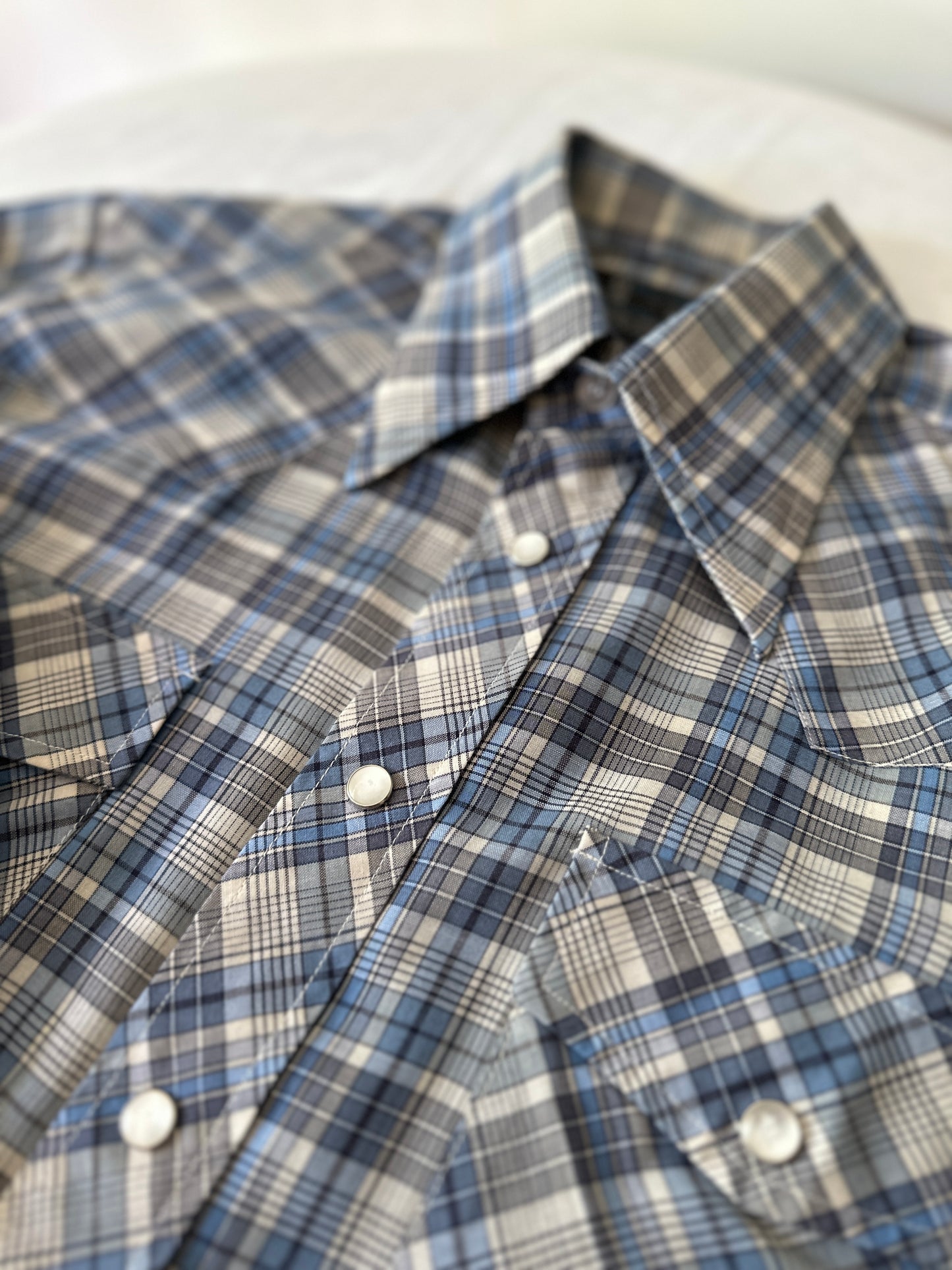 blue cross stitch button up