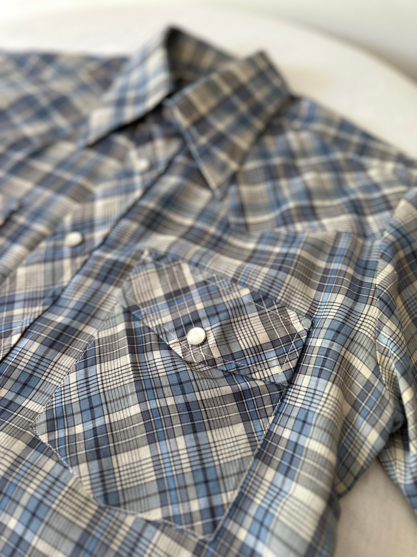 blue cross stitch button up